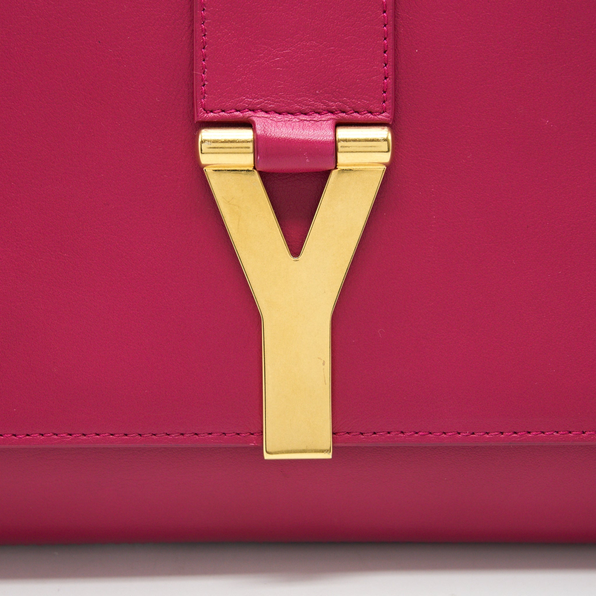 SAINT LAURENT YSL CLUTCH IN FUCHSIA