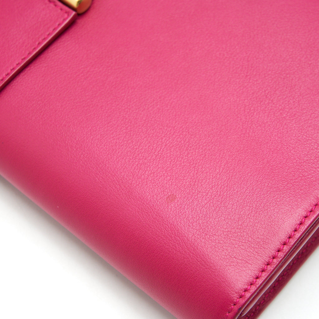 SAINT LAURENT YSL CLUTCH IN FUCHSIA