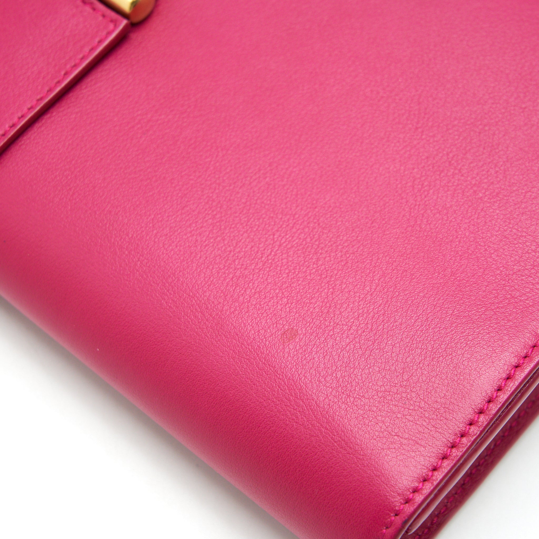 SAINT LAURENT YSL CLUTCH IN FUCHSIA