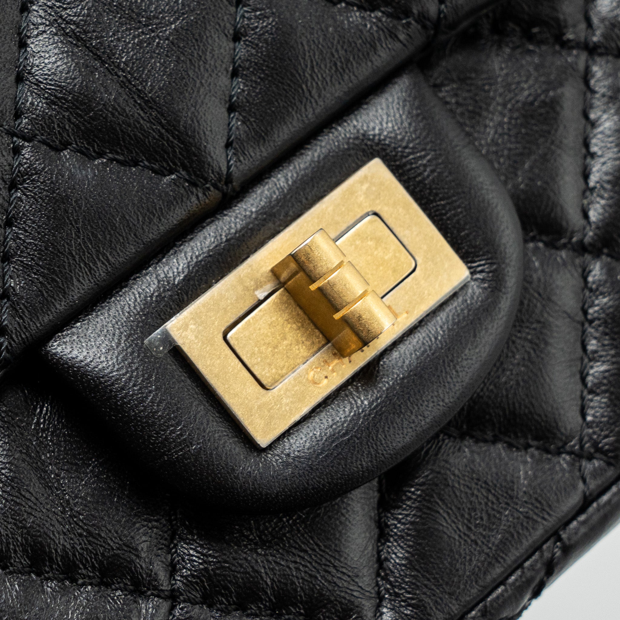 CHANEL MINI 2.55 REISSUE FLAP BAG AGED CALFSKIN BLACK BRUSHED GHW