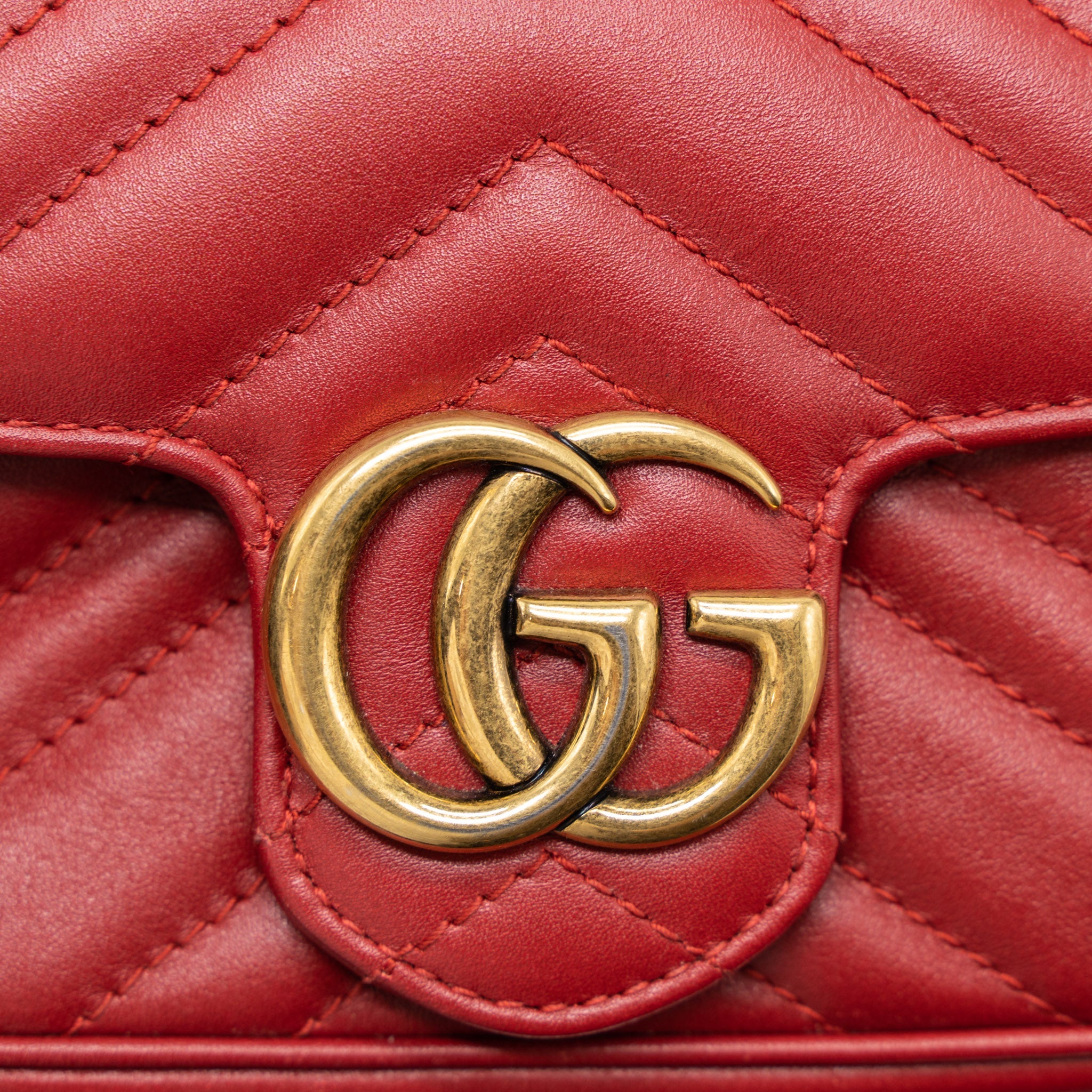 GUCCI GG MARMONT SUPER MINI BAG MATELASSÉ CALFSKIN RED BRUSHED GHW