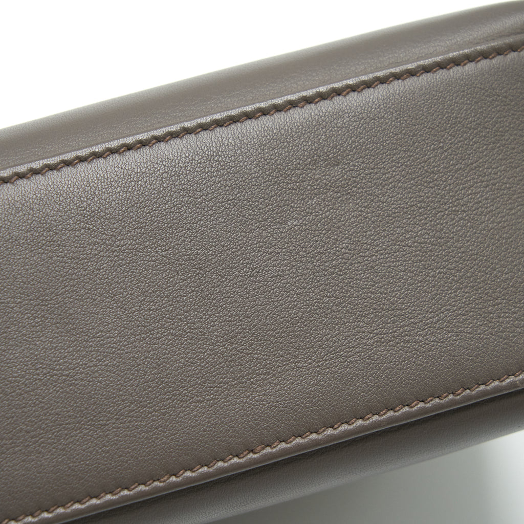 HERMES KELLY POCHETTE SWIFT 8F GRIS ETAIN GHW