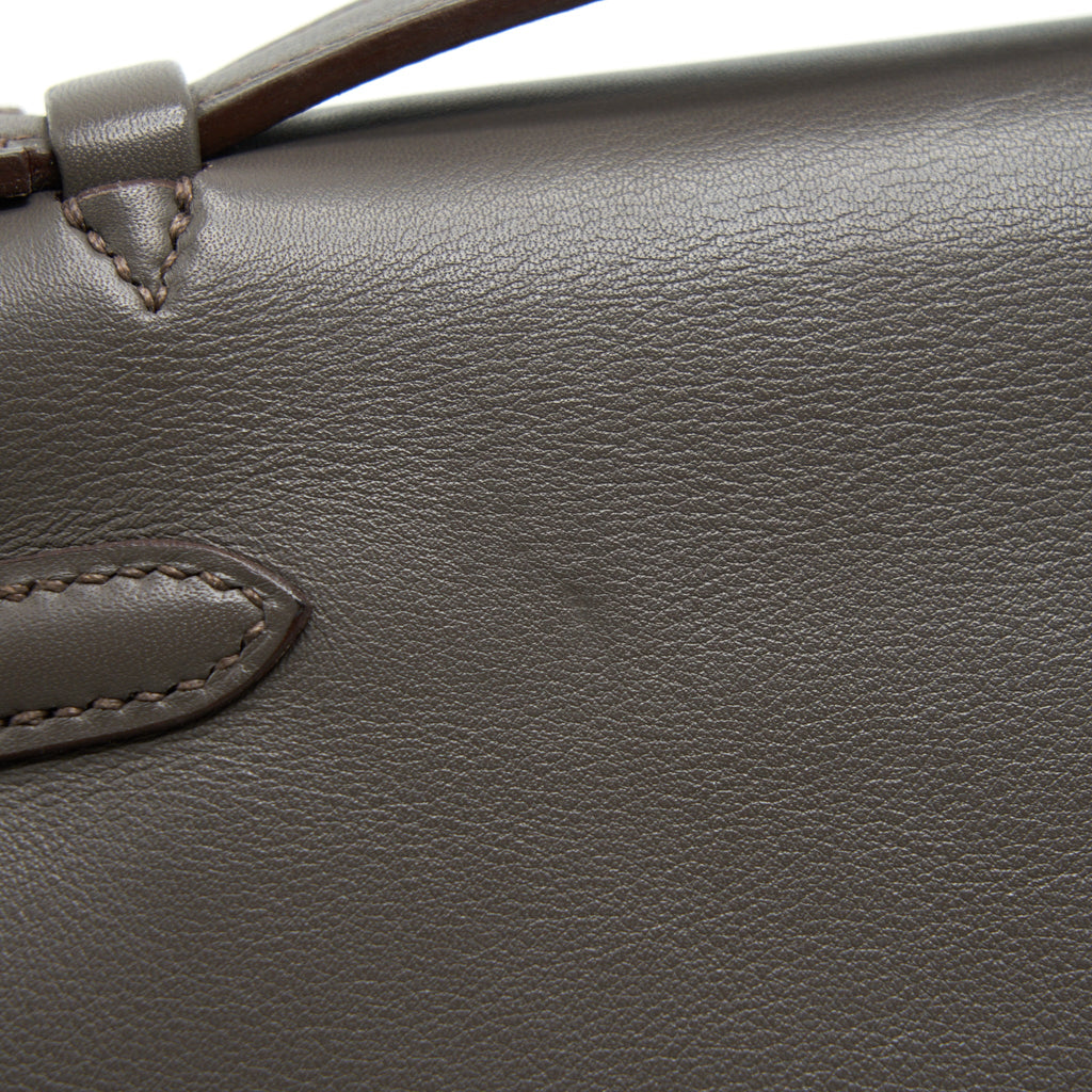 HERMES KELLY POCHETTE SWIFT 8F GRIS ETAIN GHW