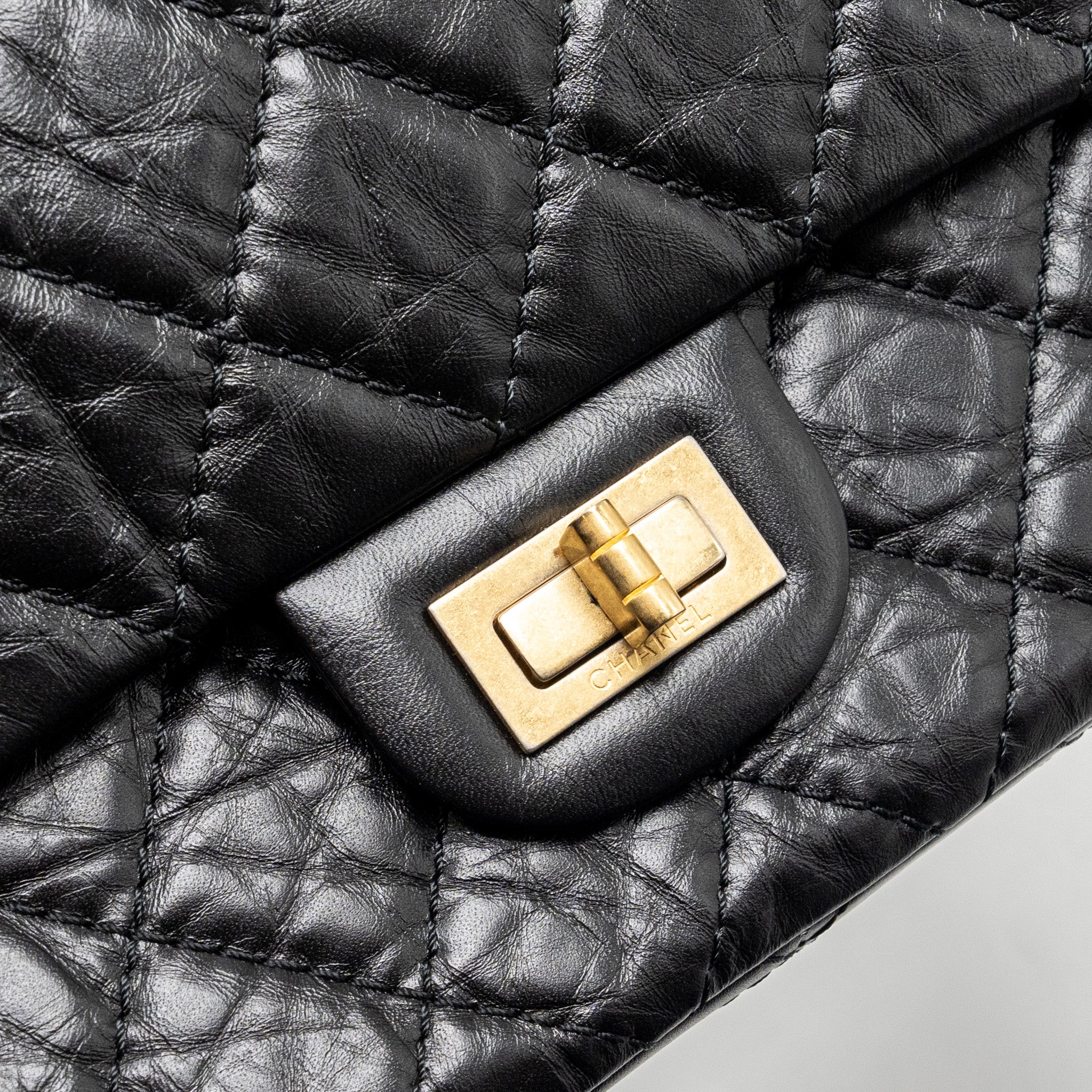 CHANEL LARGE 2.55 REISSUE FLAP BAG AGED CALFSKIN BLACK GHW