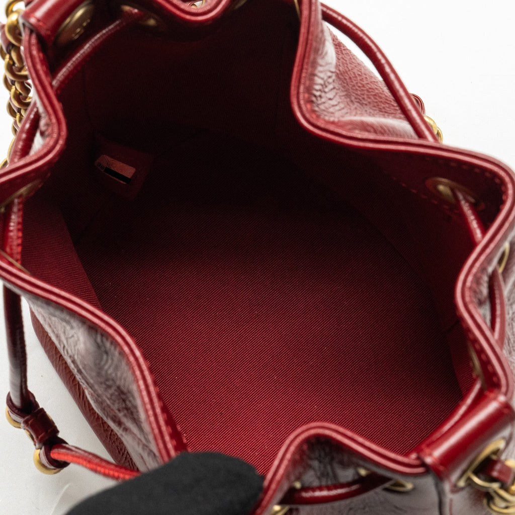 CHANEL CC DRAWSTRING MINI BUCKET BAG SHINY AGED CALFSKIN RED GHW