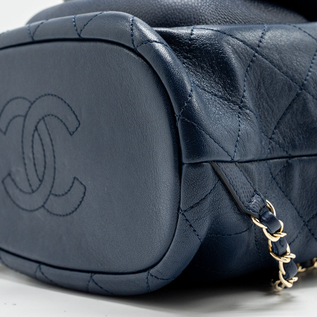 CHANEL DRAWSTRING BACKPACK LAMBSKIN/GRAINED CALFSKIN DARK BLUE LGHW