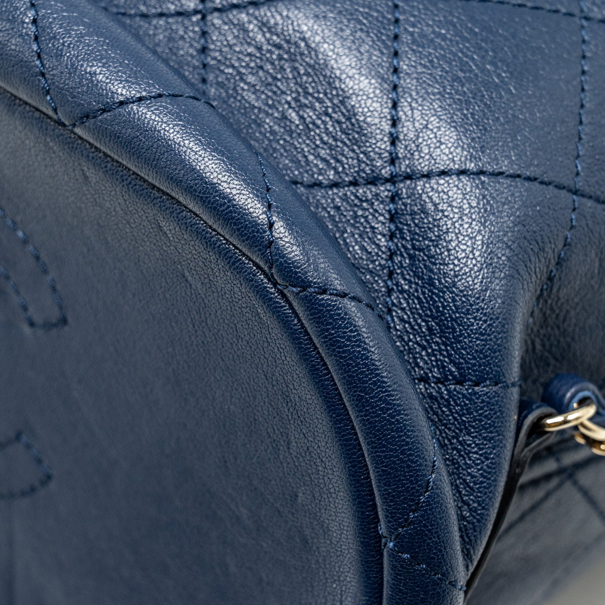 CHANEL DRAWSTRING BACKPACK LAMBSKIN/GRAINED CALFSKIN DARK BLUE LGHW
