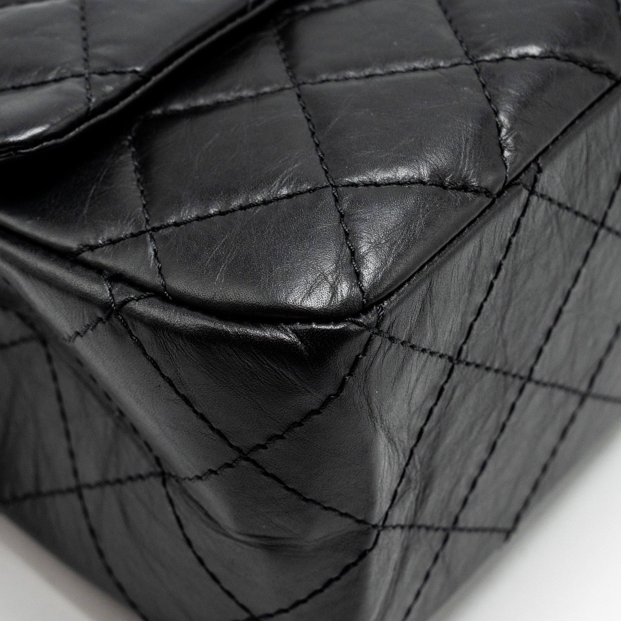 CHANEL MAXI 2.55 REISSUE FLAP BAG AGED CALFSKIN BLACK GHW