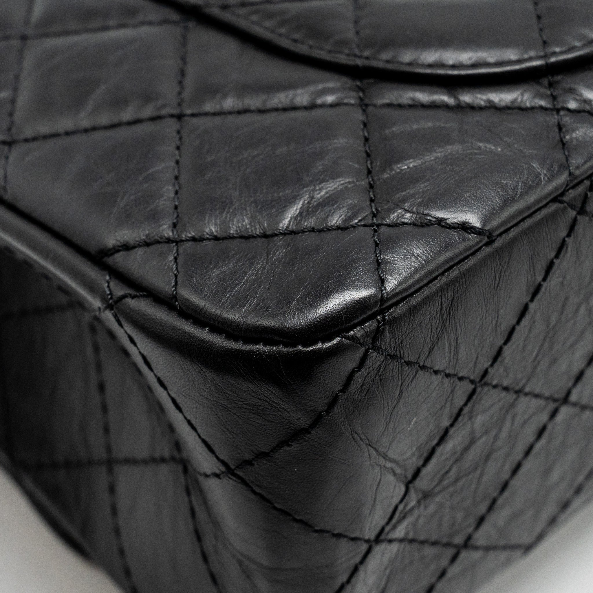 CHANEL MAXI 2.55 REISSUE FLAP BAG AGED CALFSKIN BLACK GHW