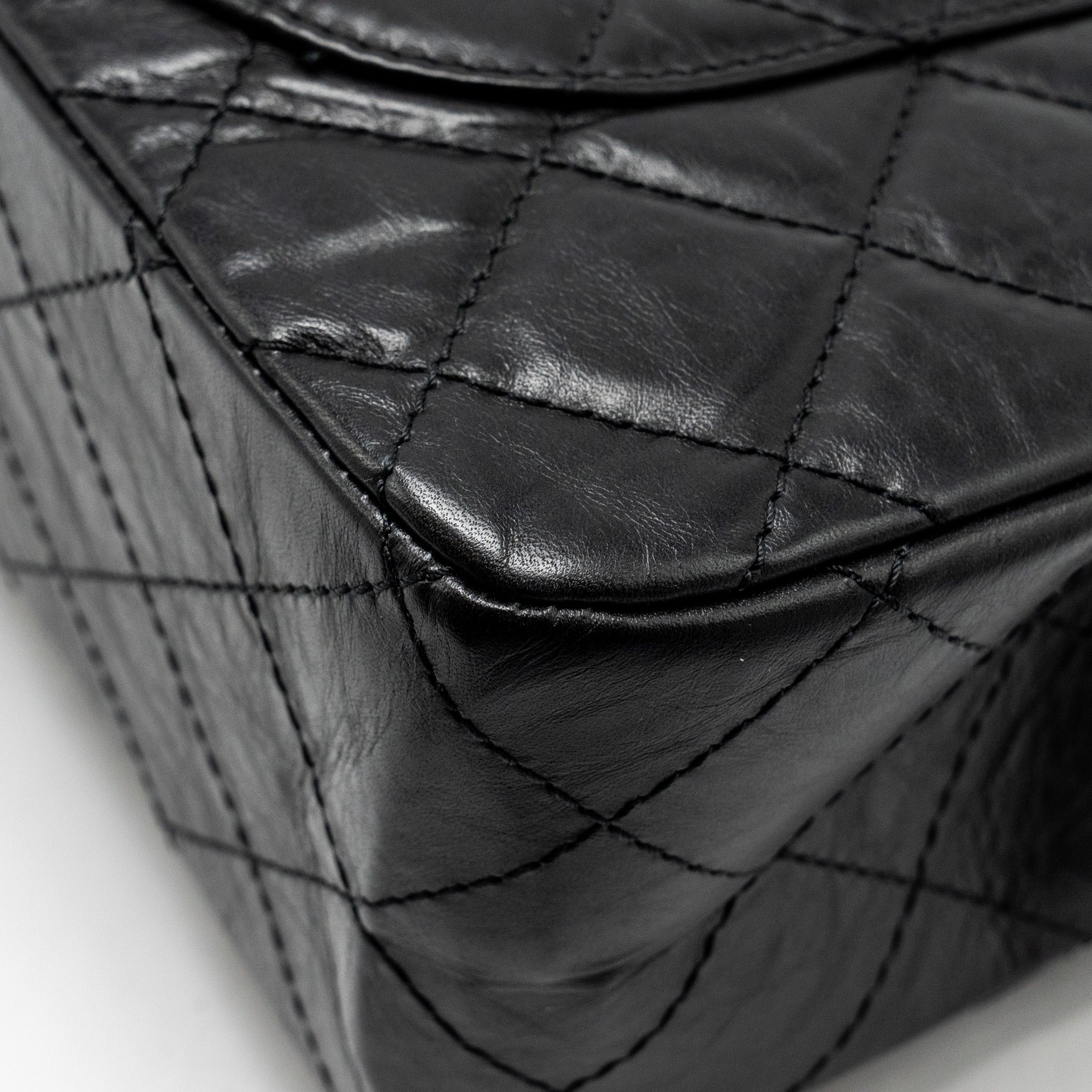 CHANEL MAXI 2.55 REISSUE FLAP BAG AGED CALFSKIN BLACK GHW