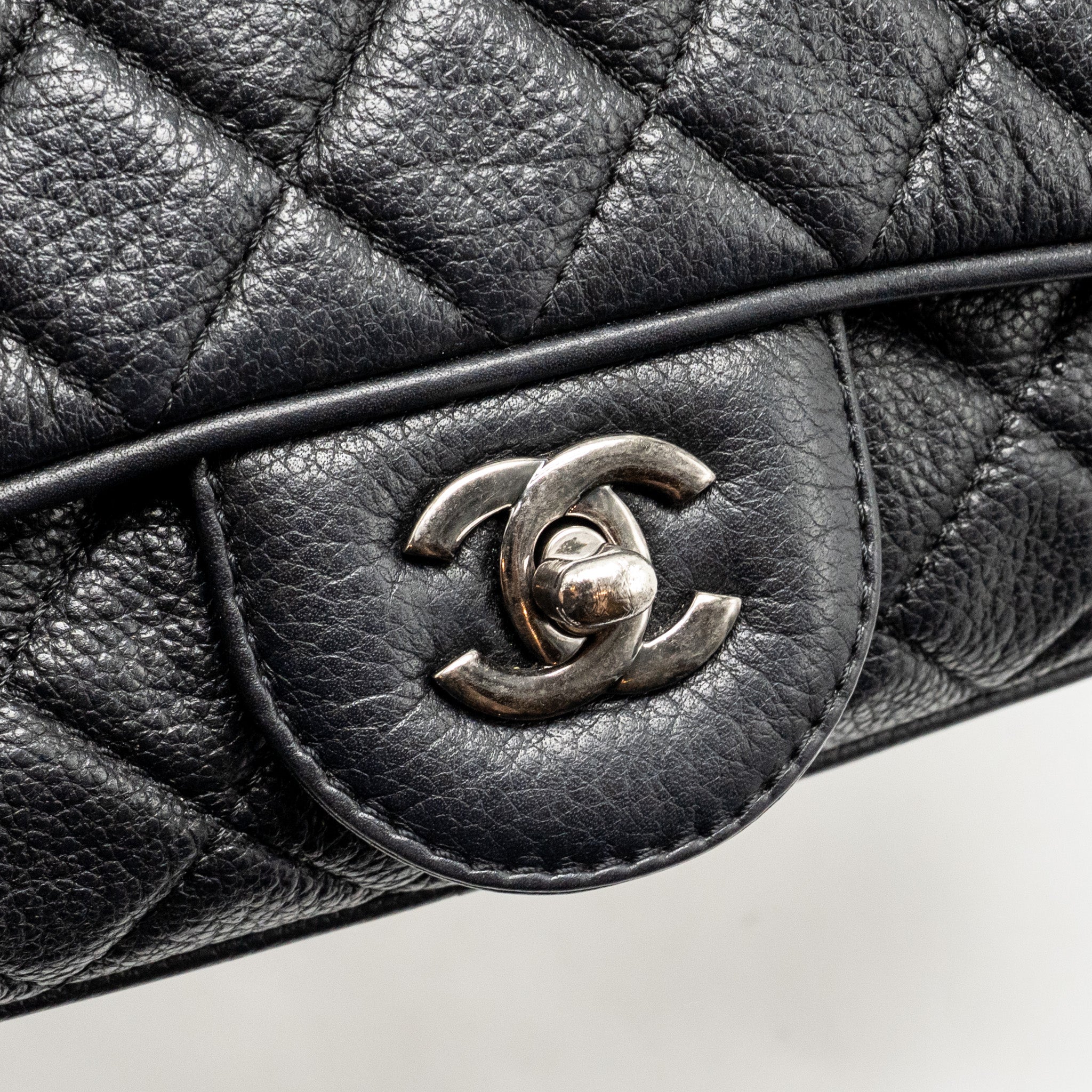 CHANEL MEDIUM CASUAL ROCK FLAP BAG GRAINED CALFSKIN BLACK RUTHENIUM HARDWARE