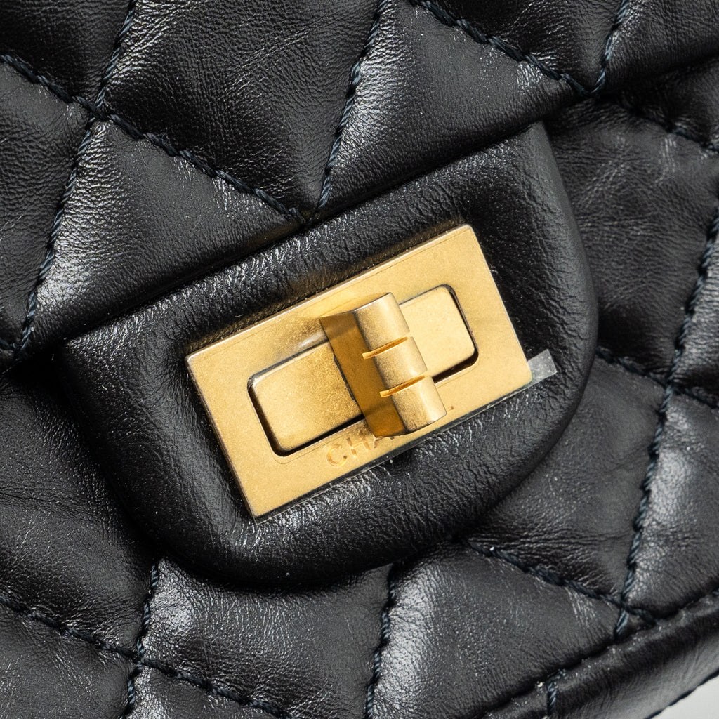 CHANEL MINI 2.55 REISSUE FLAP BAG AGED CALFSKIN BLACK GHW