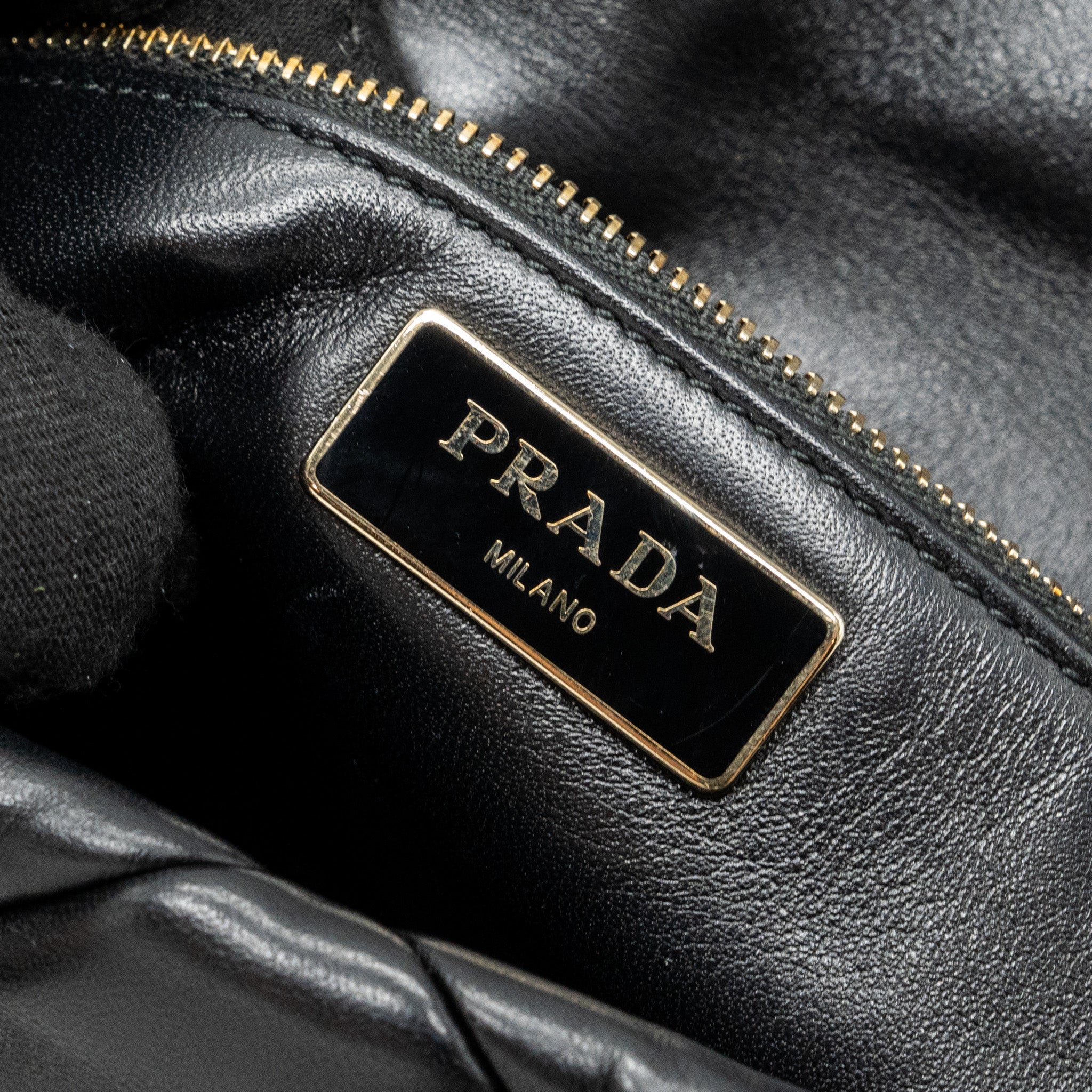 PRADA PATTINA IN PELLE NAPPA PATCH BLACK GHW