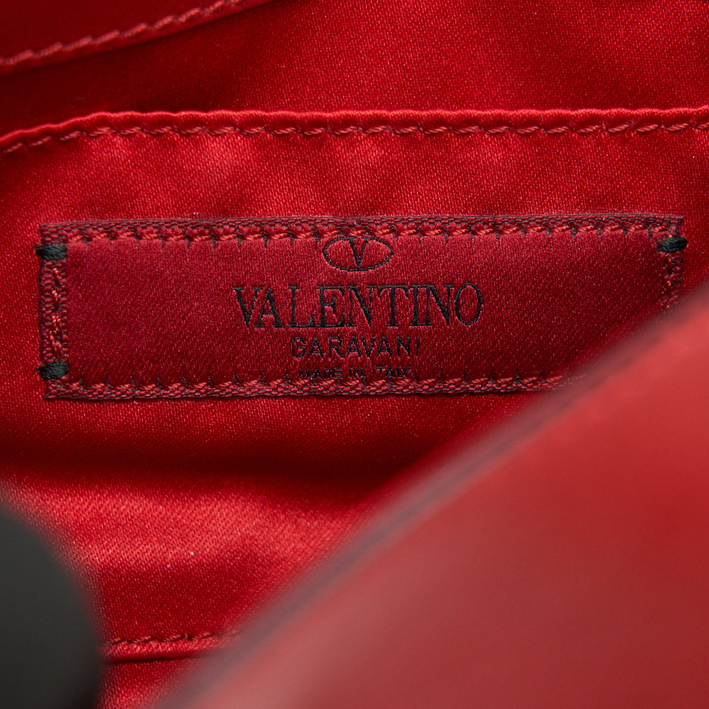 VALENTINO ROCKSTUD SMALL SADDLE BAG IN RED