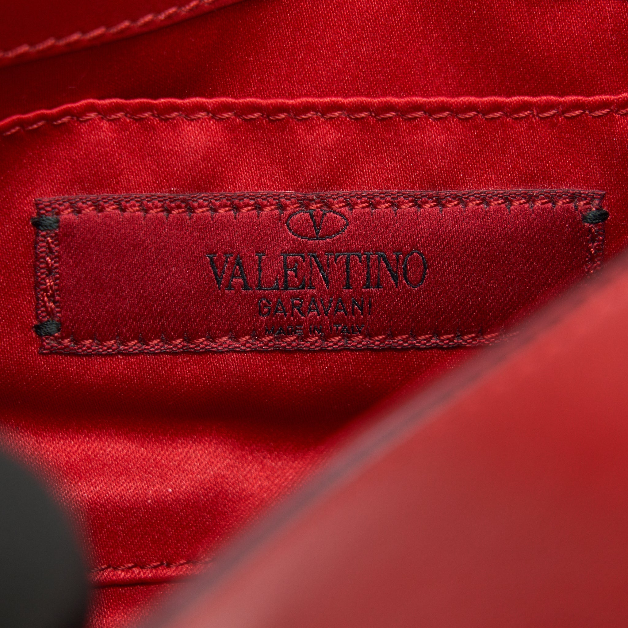 VALENTINO ROCKSTUD SMALL SADDLE BAG IN RED