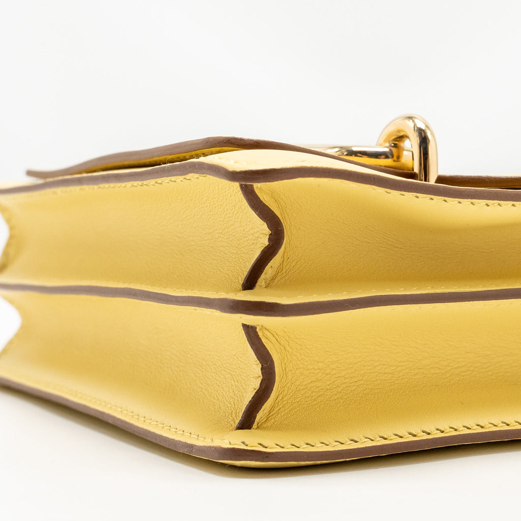 HERMES MINI ROULIS SWIFT 1Z JAUNE POUSSIN GHW