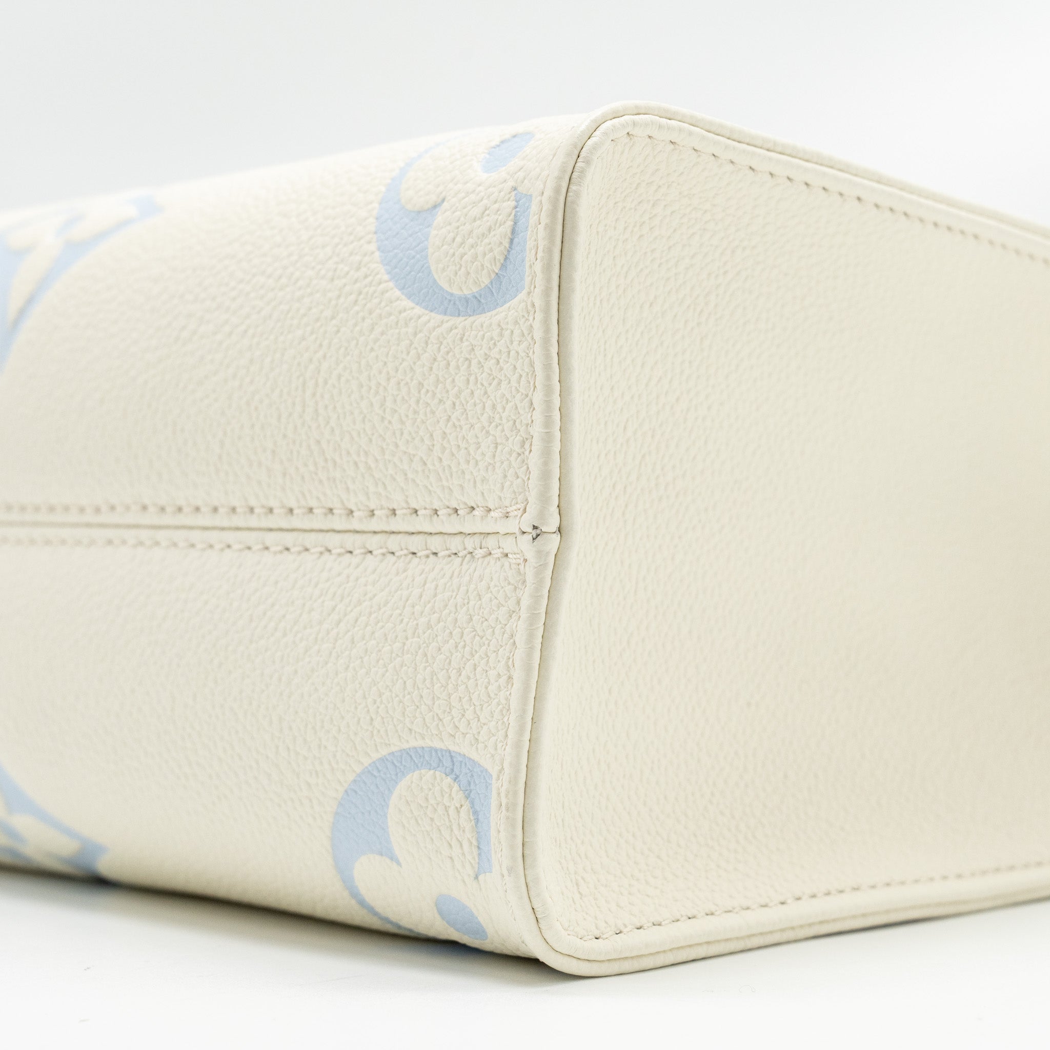 LOUIS VUITTON ONTHEGO PM BICOLOUR MONOGRAM EMPREINTE LATTE/CANDY BLUE GHW