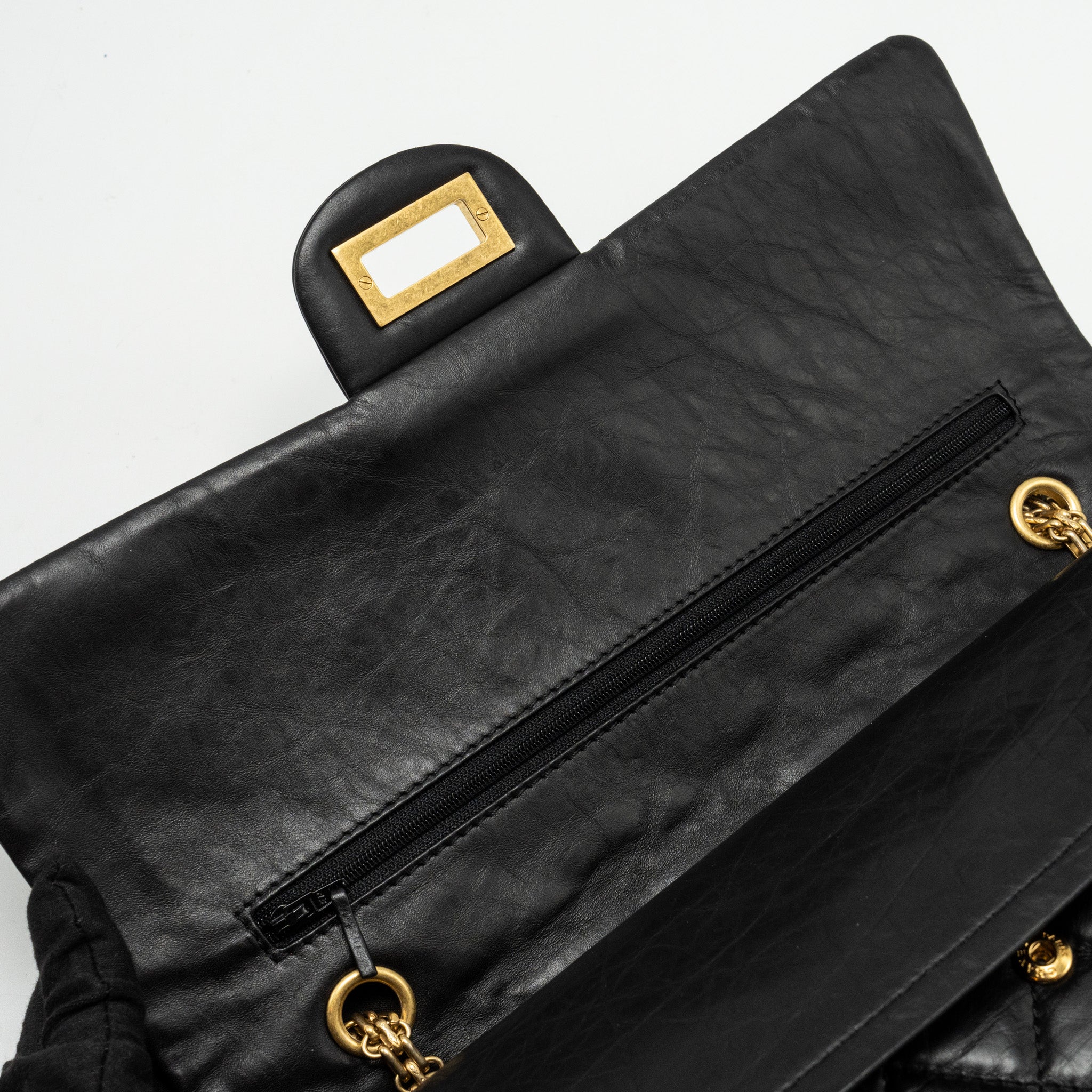 CHANEL MAXI 2.55 REISSUE FLAP BAG AGED CALFSKIN BLACK GHW