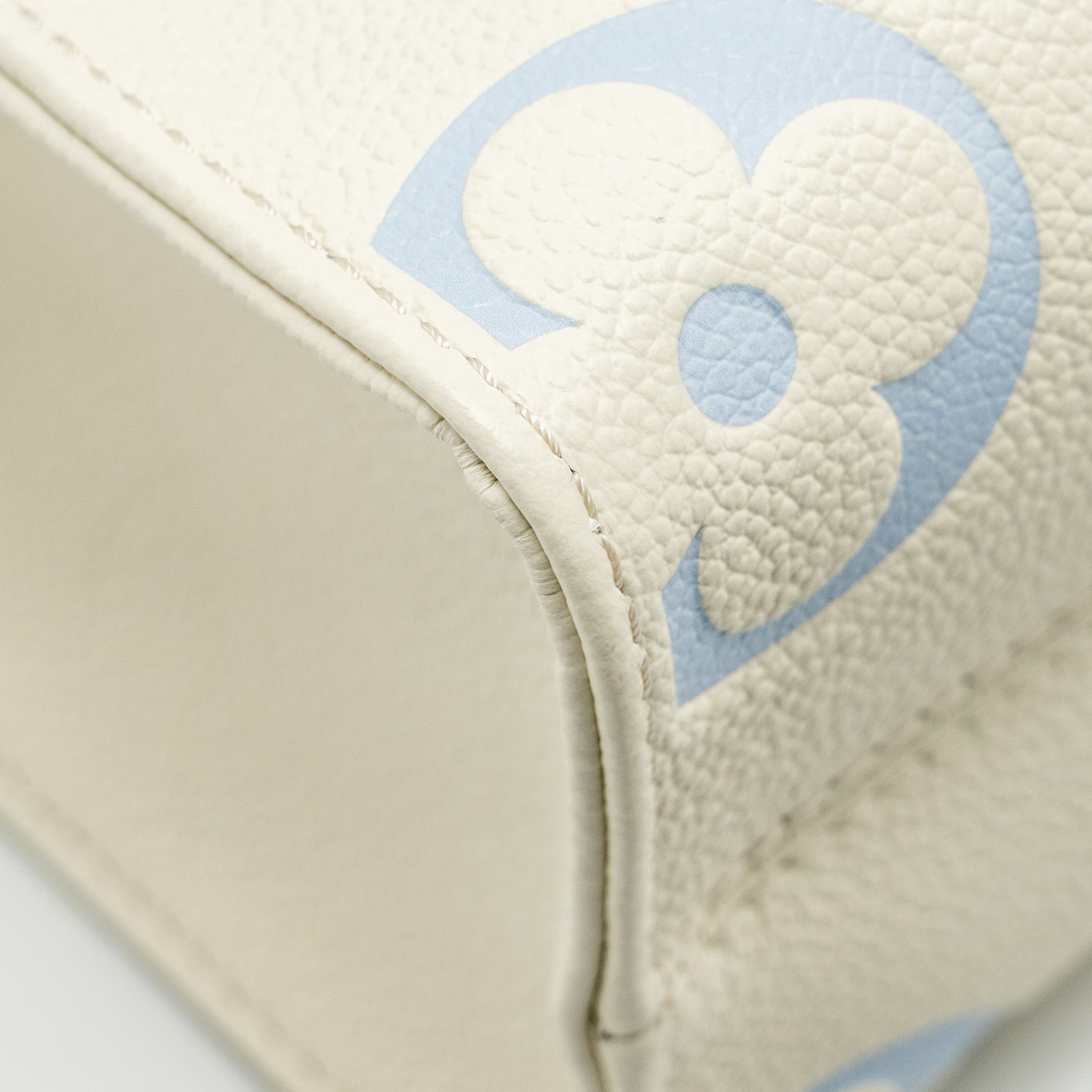 LOUIS VUITTON ONTHEGO PM BICOLOUR MONOGRAM EMPREINTE LATTE/CANDY BLUE GHW