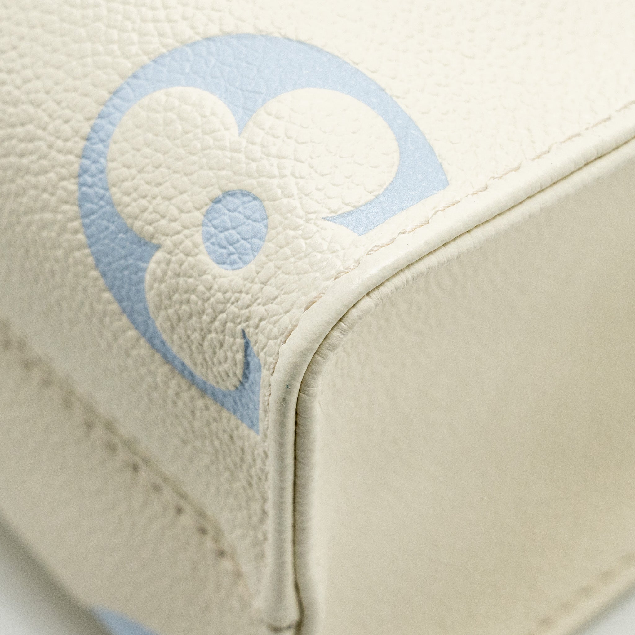 LOUIS VUITTON ONTHEGO PM BICOLOUR MONOGRAM EMPREINTE LATTE/CANDY BLUE GHW