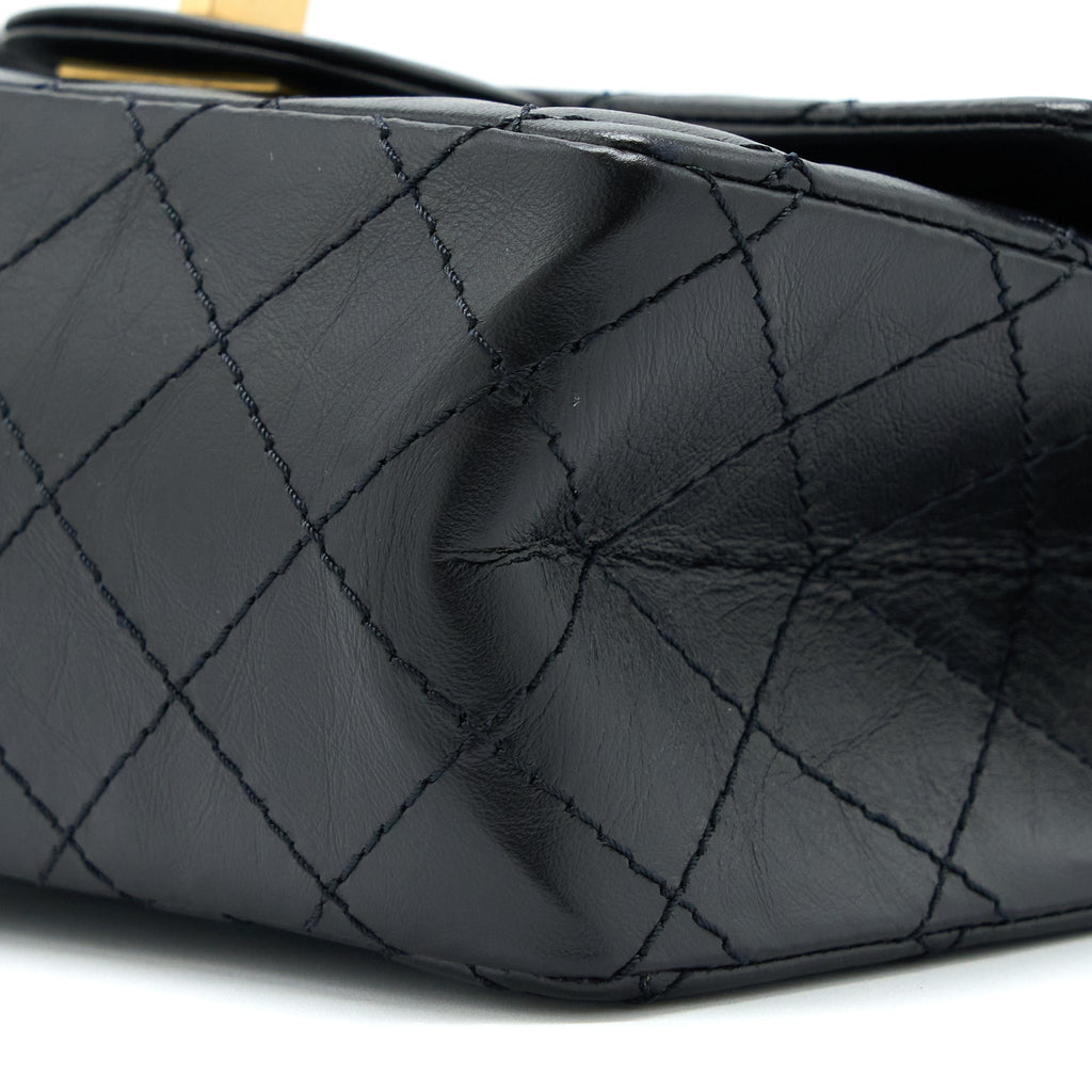 CHANEL MINI 2.55 REISSUE FLAP BAG AGED CALFSKIN BLACK BRUSHED GHW (MICROCHIP)