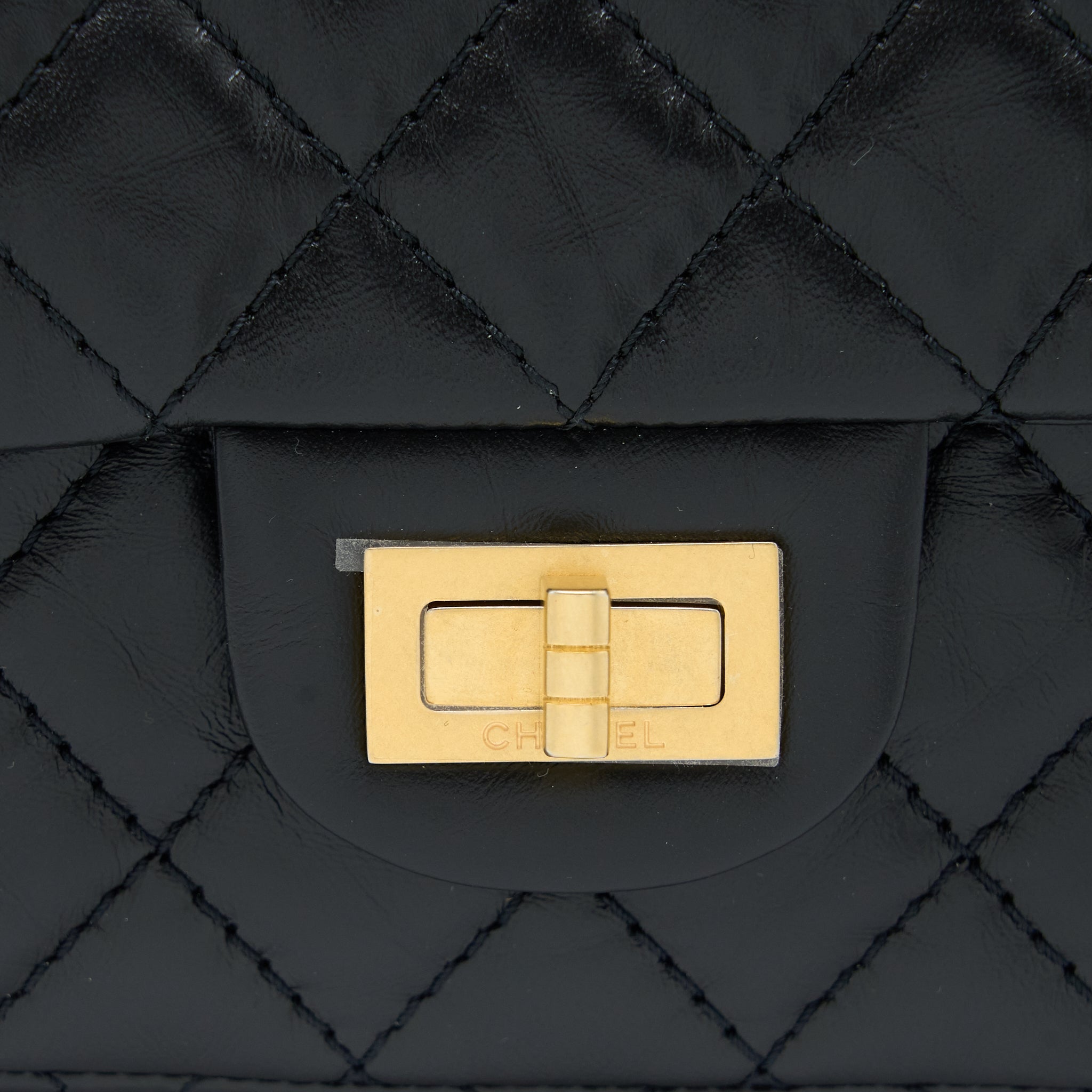 CHANEL MINI 2.55 REISSUE FLAP BAG AGED CALFSKIN BLACK BRUSHED GHW (MICROCHIP)