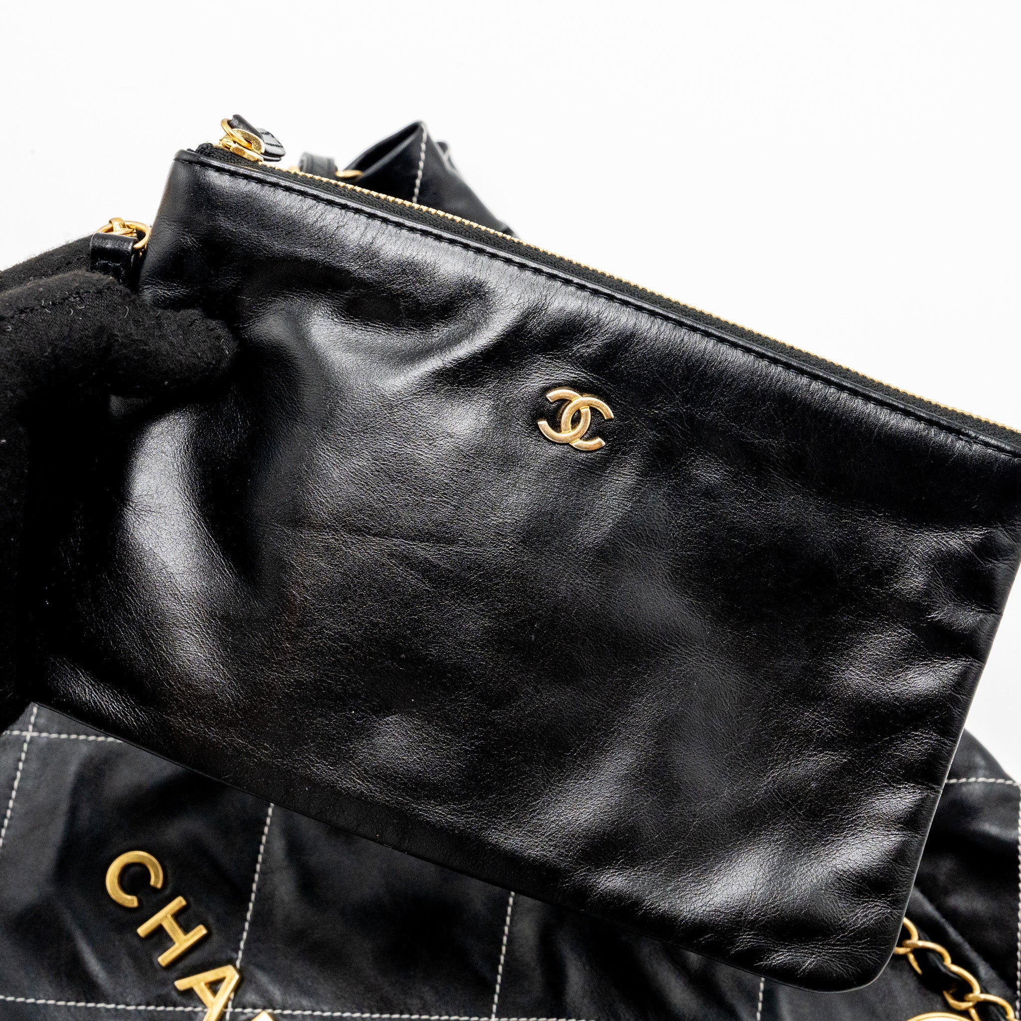 CHANEL MEDIUM 22 BAG SHINY CALFSKIN BLACK WITH WHITE STITCHING GOLD LETTER GHW (MICROCHIP)
