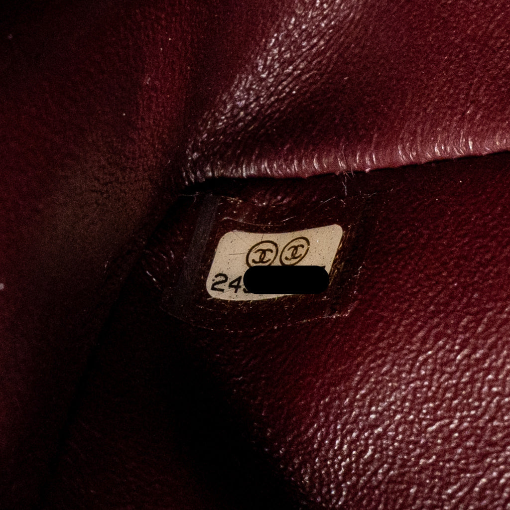 CHANEL MINI 2.55 REISSUE FLAP BAG LUCKY CHARMS AGED CALFSKIN BLACK GHW