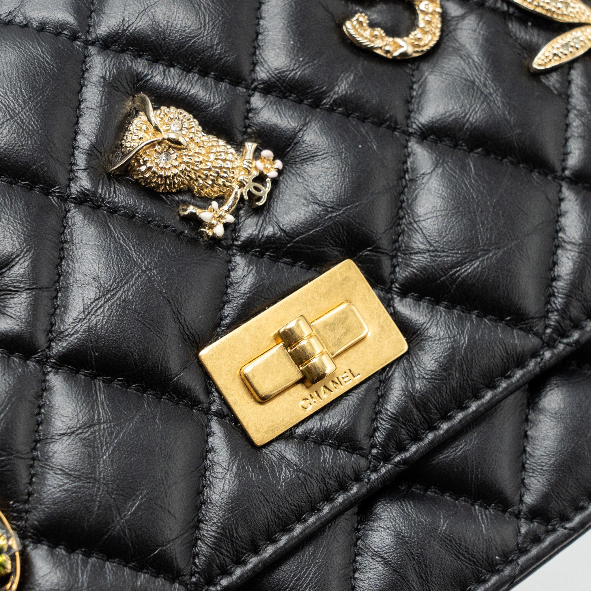 CHANEL 2.55 REISSUE LUCKY CHARMS WALLET ON CHAIN AGED CALFSKIN BLACK GHW