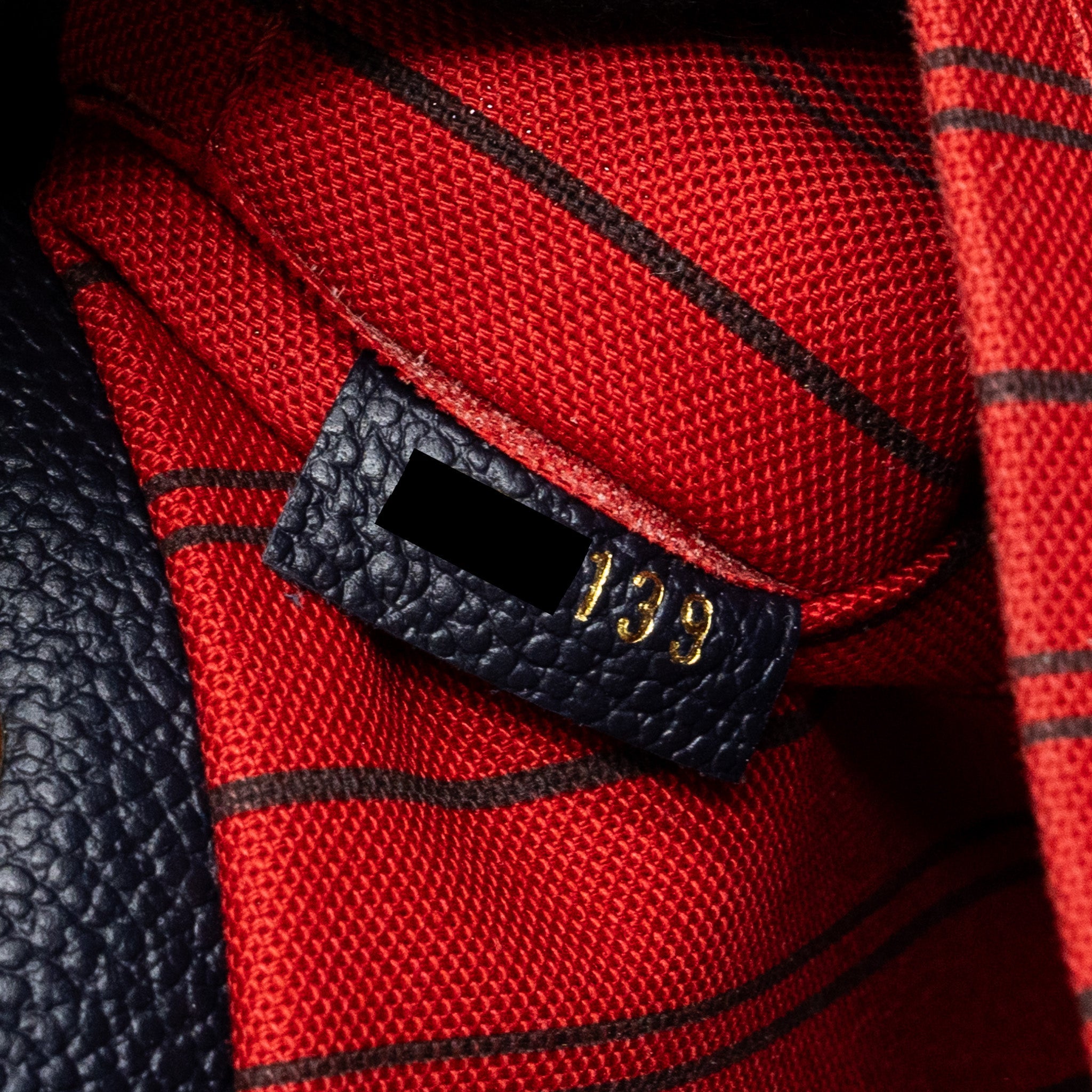 LOUIS VUITTON MONTAIGNE MM MONOGRAM EMPREINTE NAVY GHW