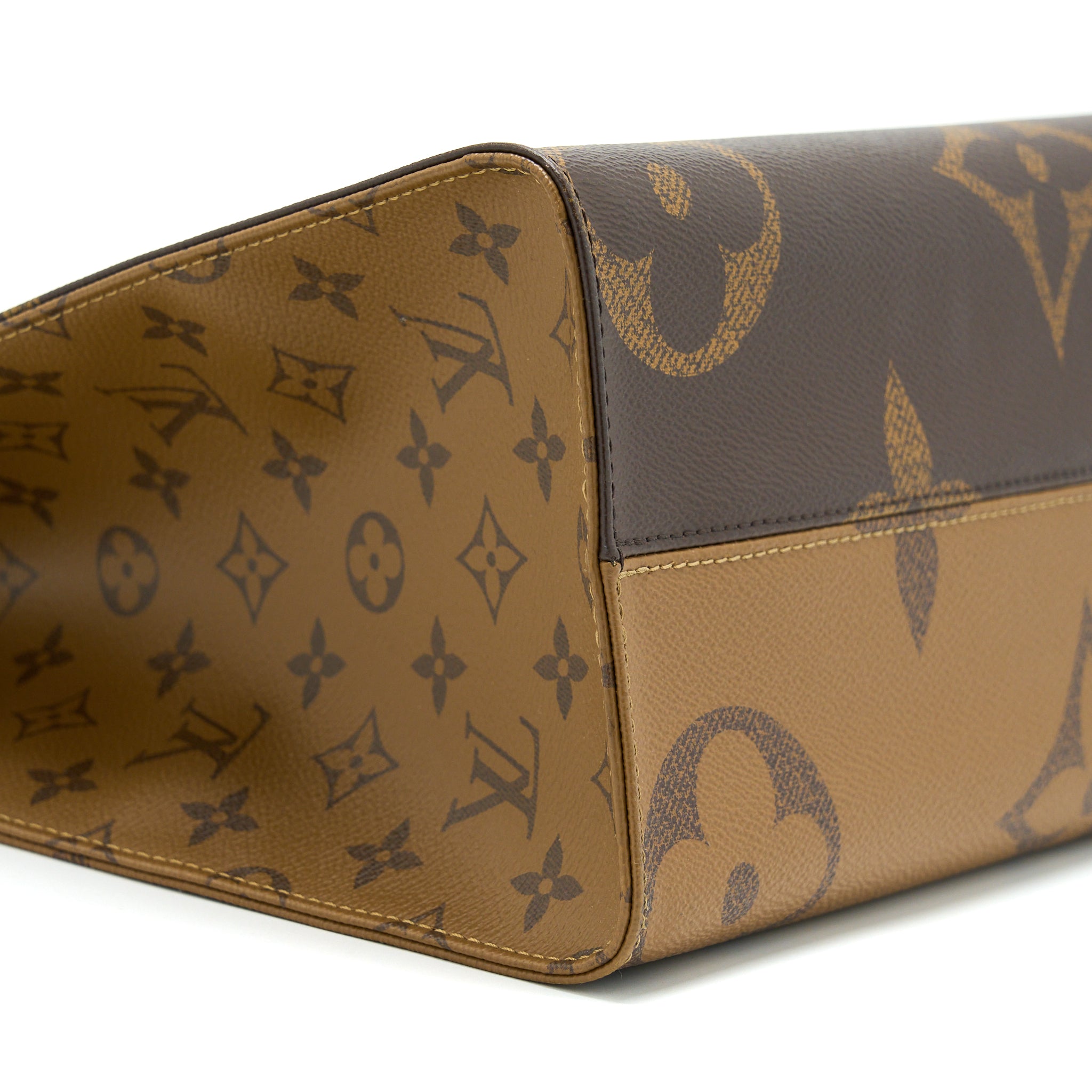 LOUIS VUITTON ON THE GO MM MONOGRAM REVERSE CANVAS GHW