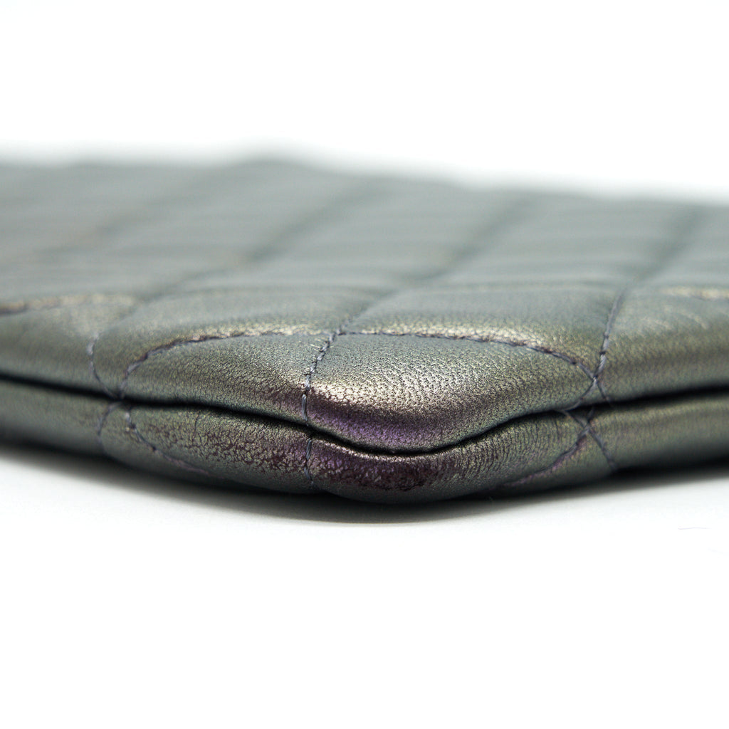 CHANEL QUILTED LEATHER CLUTCH BAG IN METALLIC PURPLE