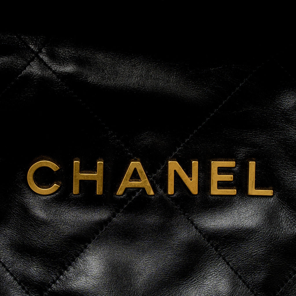 CHANEL MEDIUM 22 BAG GOLD LETTER SHINY CALFSKIN BLACK BRUSHED GHW (MICROCHIP)