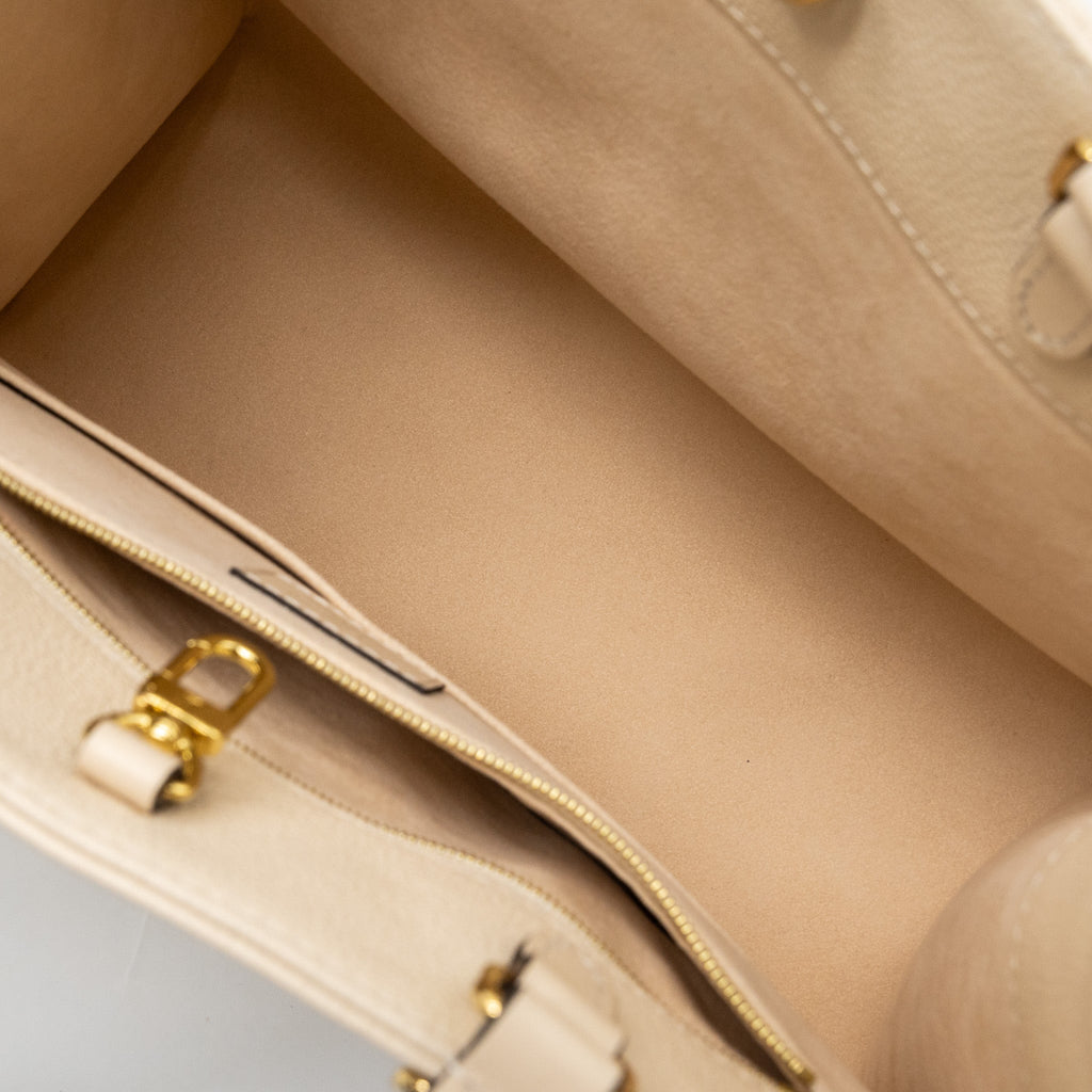 LOUIS VUITTON ONTHEGO MM EMPREINTE LEATHER WHITE GHW (NEW VERSION)