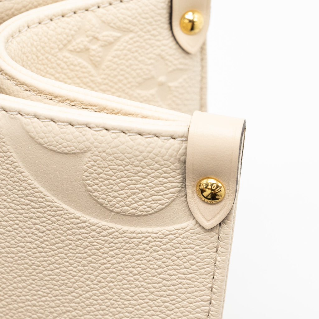 LOUIS VUITTON ONTHEGO MM EMPREINTE LEATHER WHITE GHW (NEW VERSION)