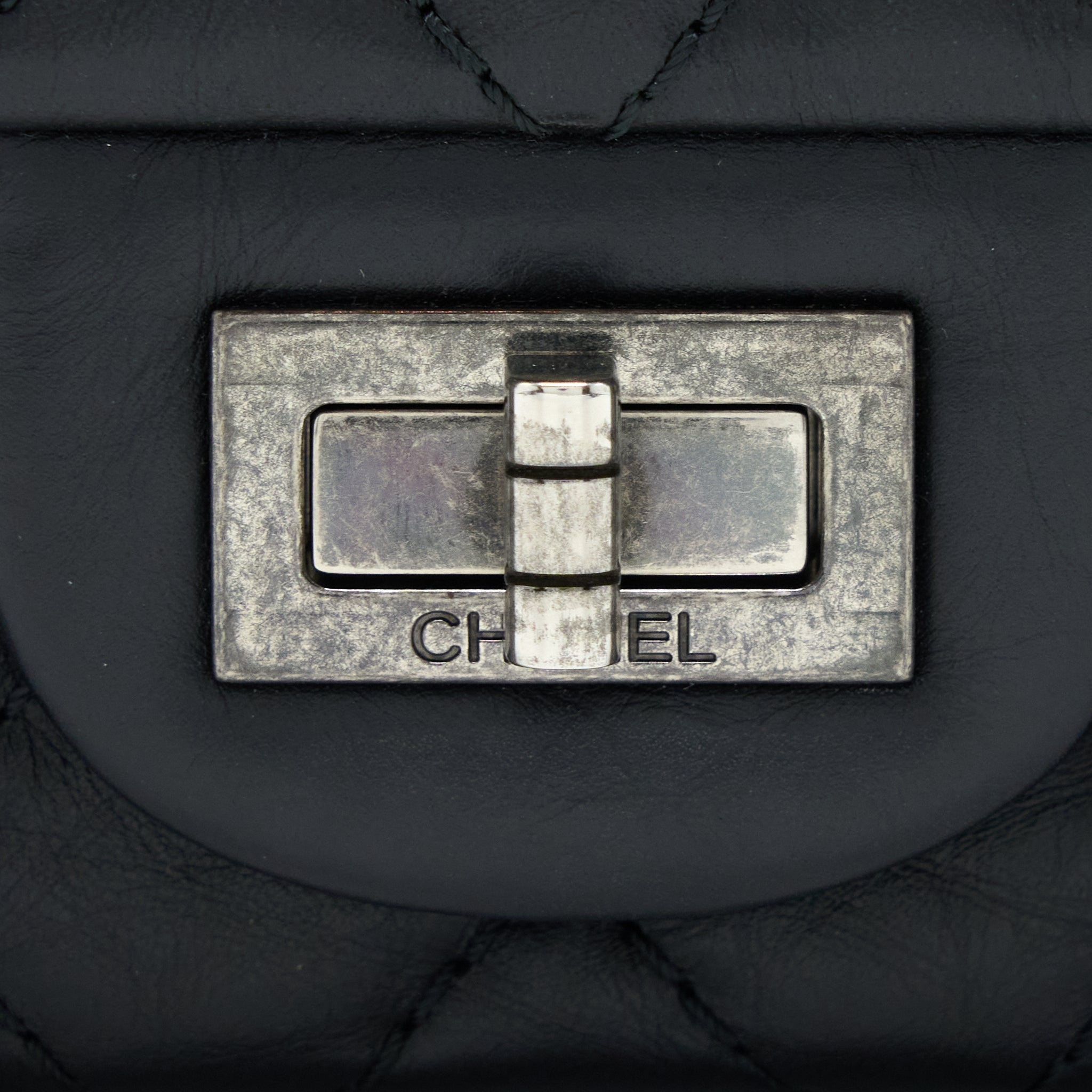 CHANEL SMALL 2.55 REISSUE FLAP BAG AGED CALFSKIN BLACK WITH RUTHENIUM HARDWARE