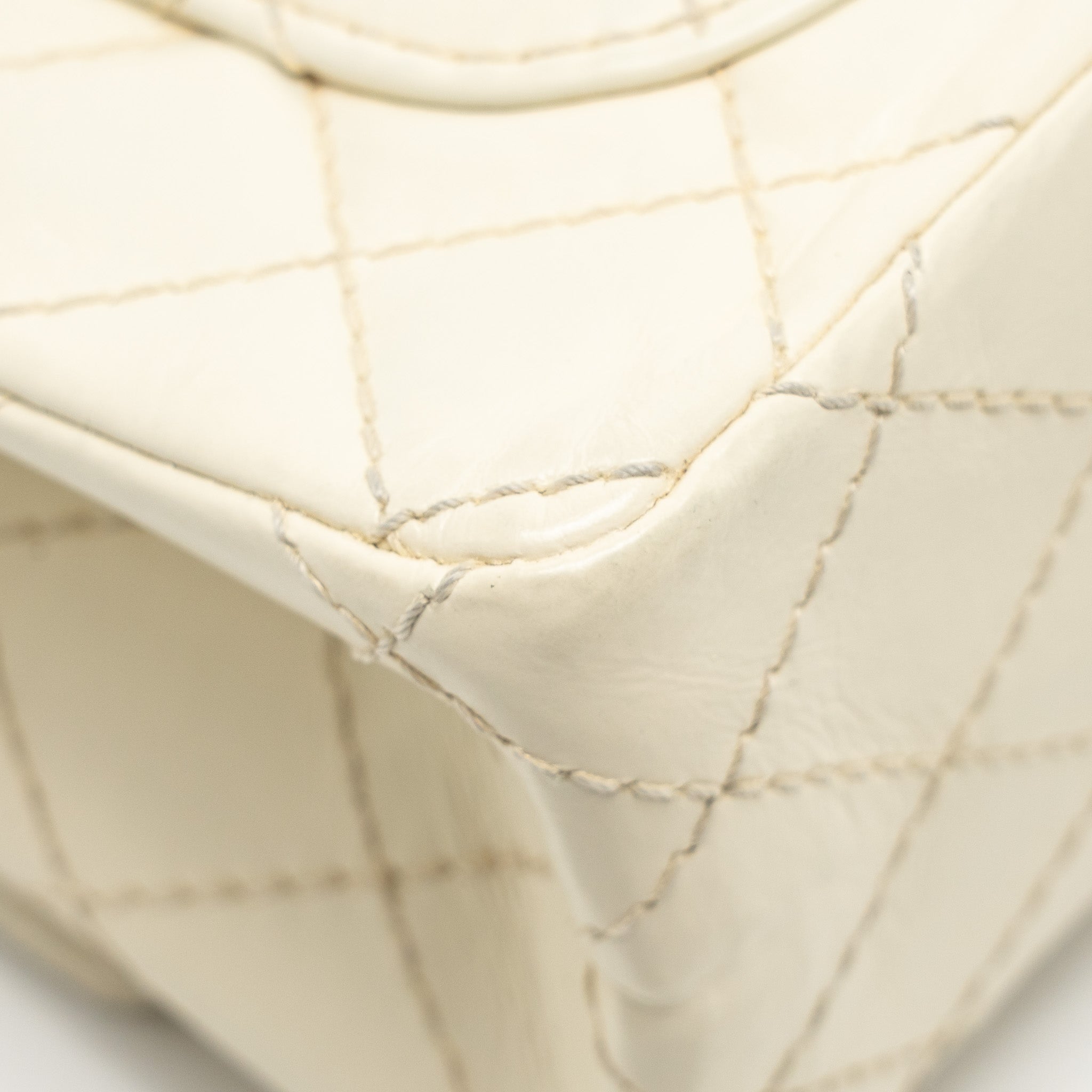 CHANEL MINI 2.55 REISSUE FLAP BAG AGED CALFSKIN CREAMY WHITE WITH RUTHENIUM HARDWARE
