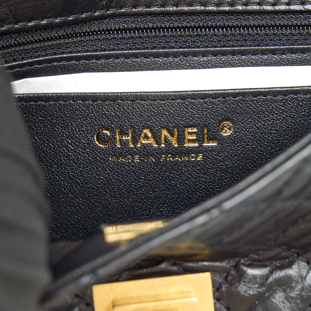 CHANEL MINI 2.55 REISSUE FLAP BAG AGED CALFSKIN BLACK BRUSHED GHW (MICROCHIP)