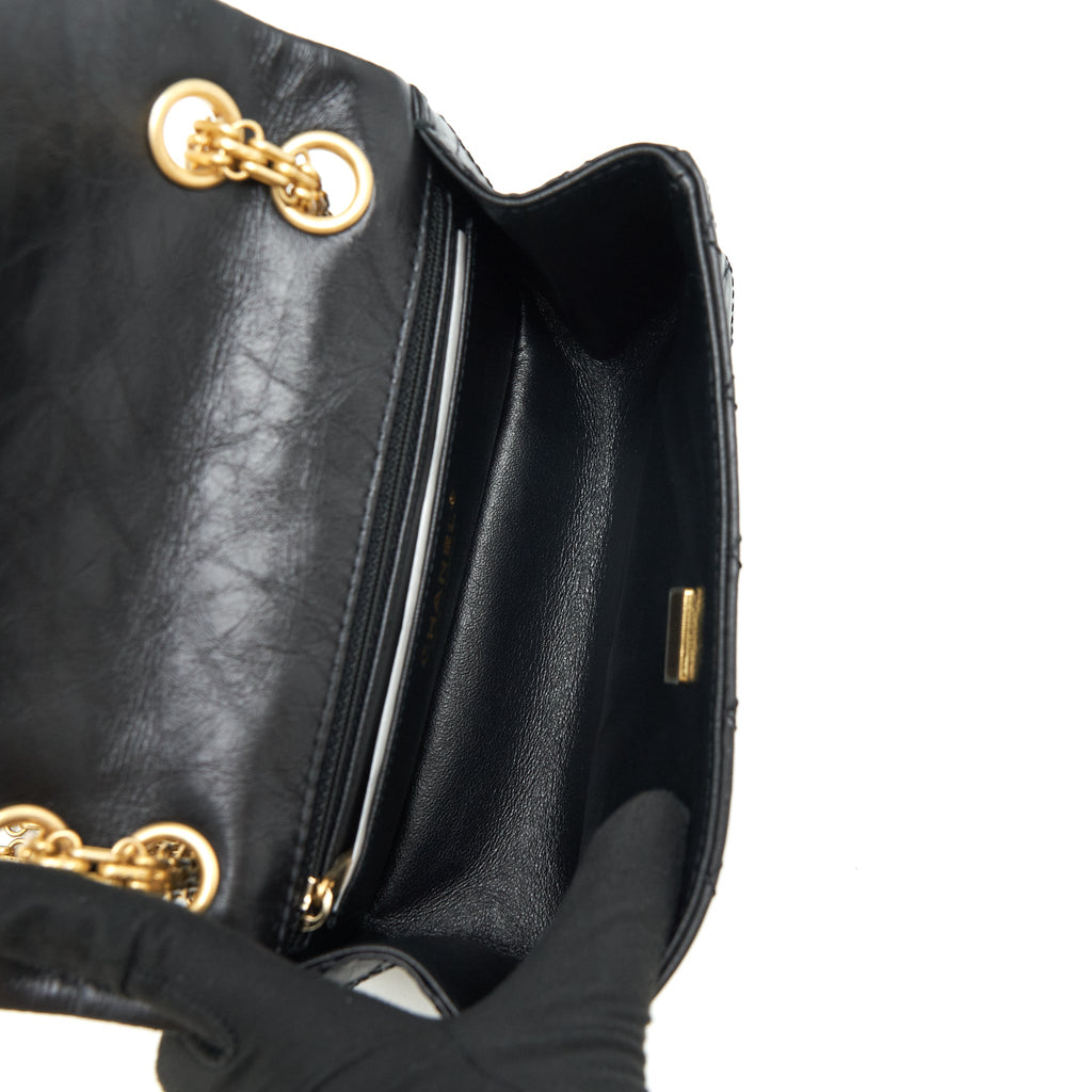 CHANEL MINI 2.55 REISSUE FLAP BAG AGED CALFSKIN BLACK BRUSHED GHW (MICROCHIP)
