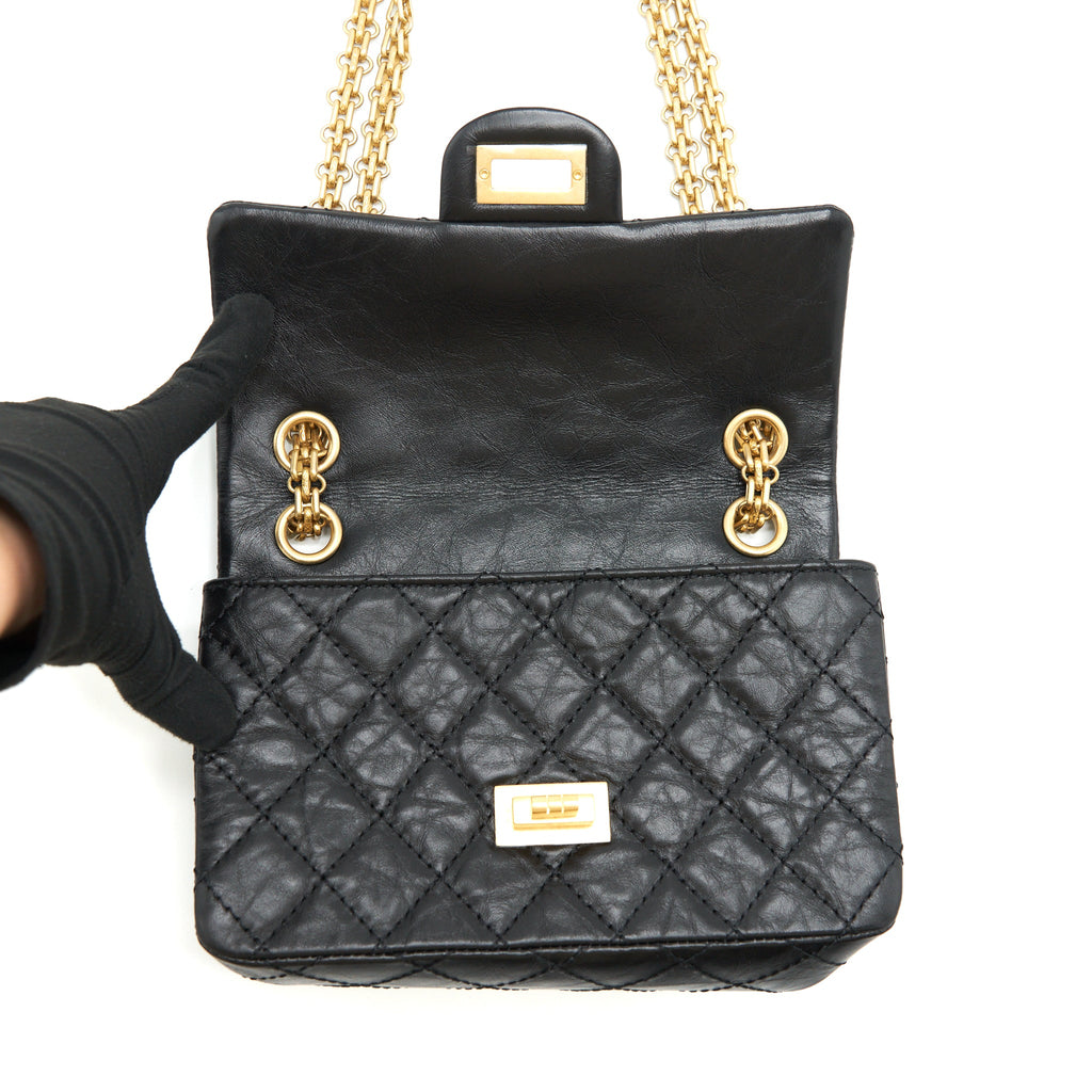 CHANEL MINI 2.55 REISSUE FLAP BAG AGED CALFSKIN BLACK BRUSHED GHW (MICROCHIP)