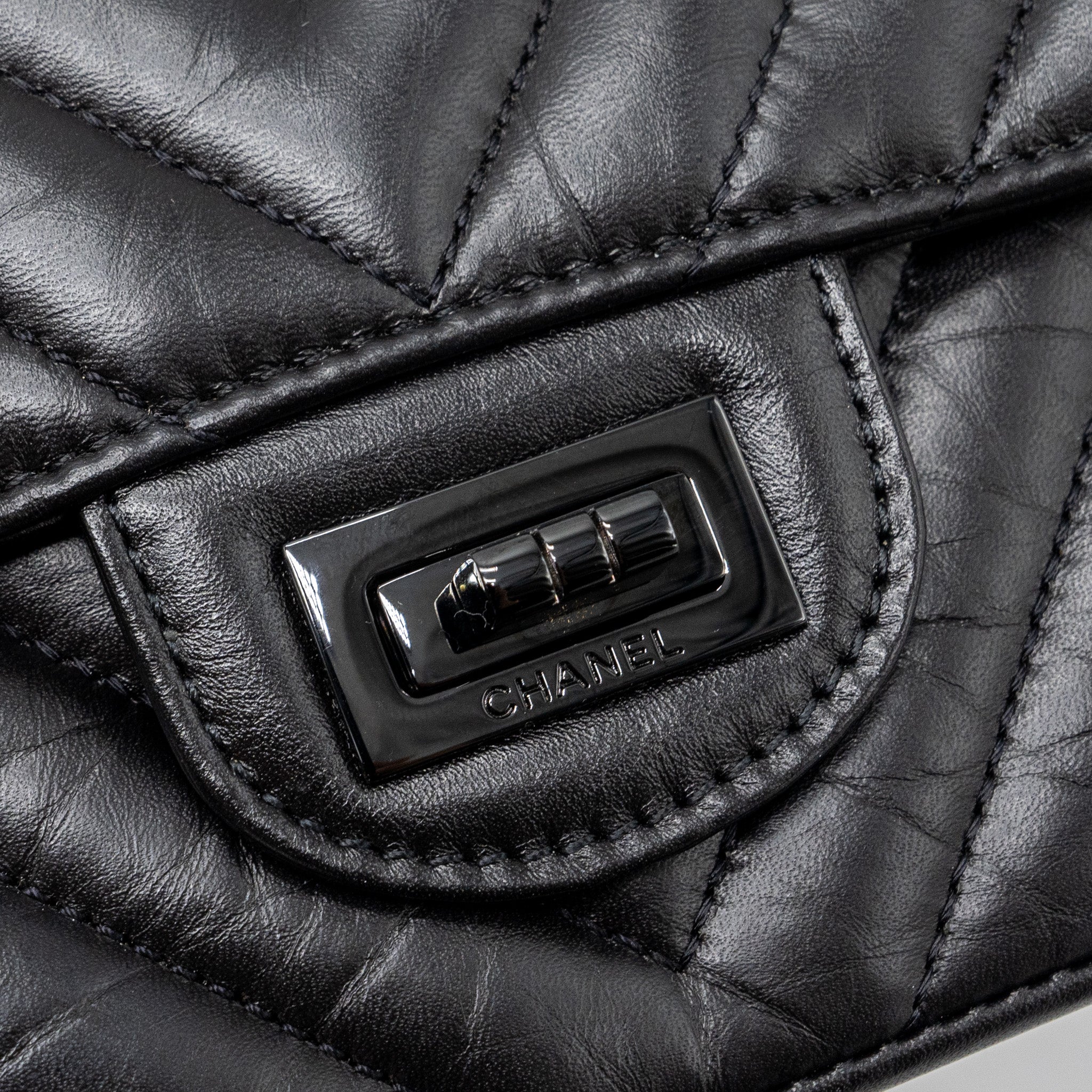 CHANEL MINI 2.55 REISSUE FLAP BAG CHEVRON CALFSKIN SO BLACK