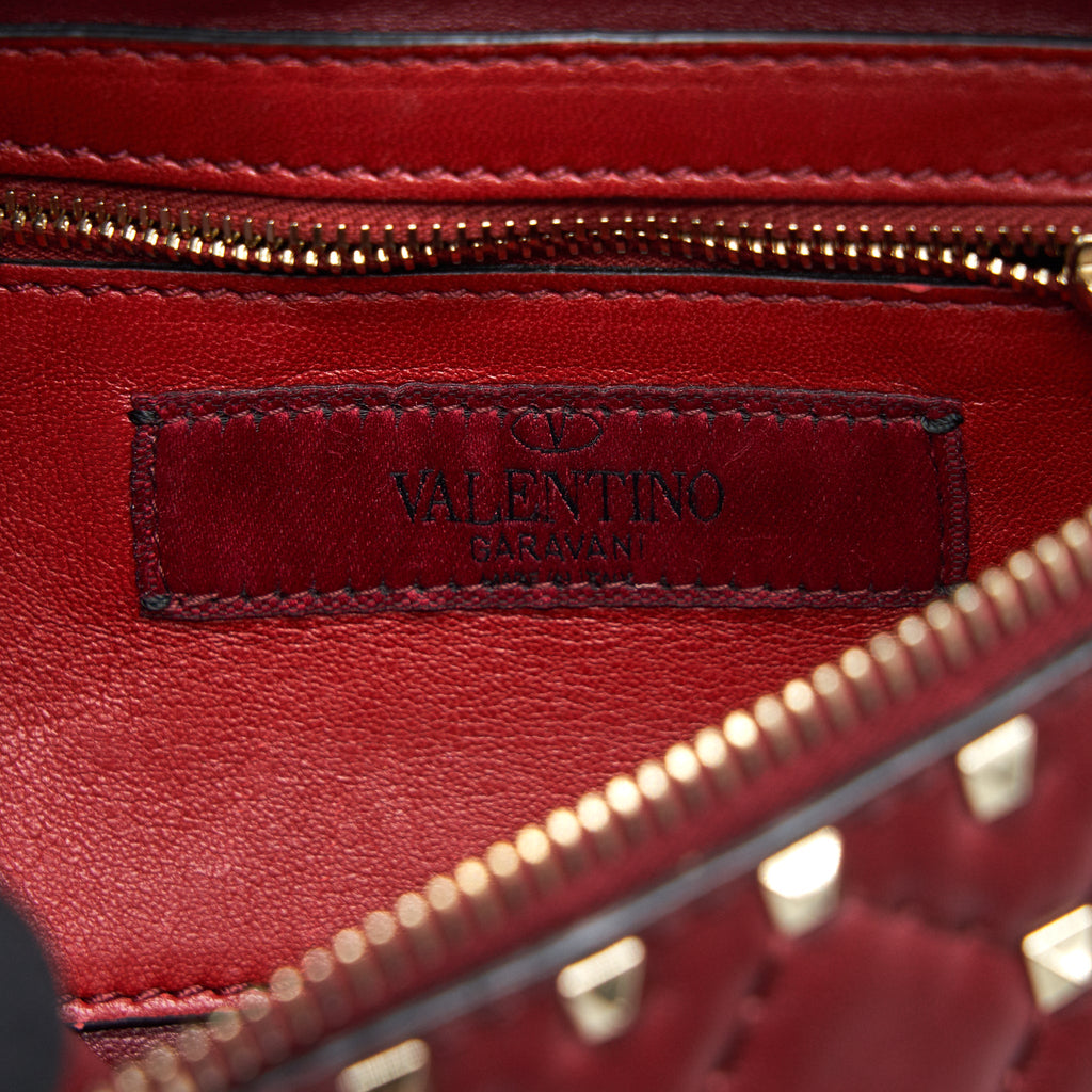 VALENTINO ROCKSTUD SPIKE QUILTED-LEATHER BELT BAG BURGUNDY 95CM