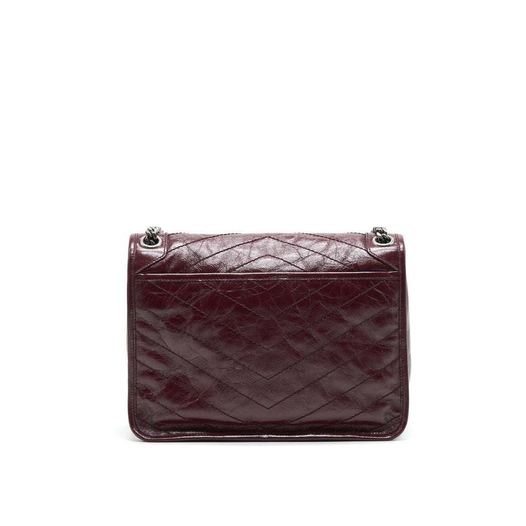 SAINT LAURENT MEDIUM NIKI SHINNY LEATHER BURGUNDY
