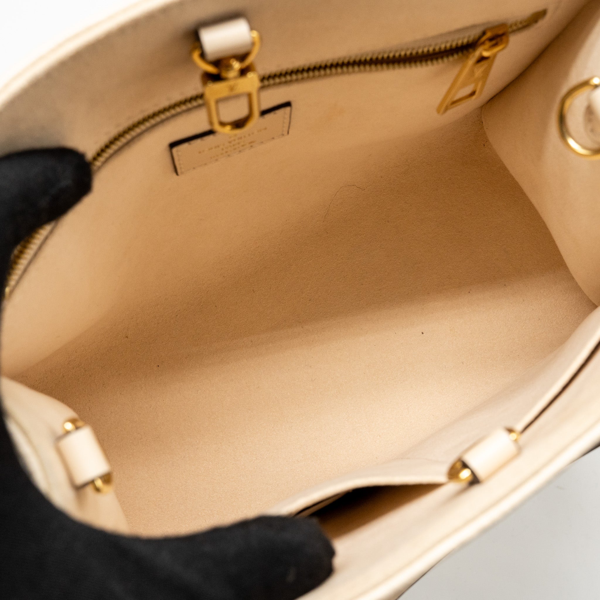 LOUIS VUITTON ONTHEGO PM MONOGRAM EMPREINTE LEATHER CREME GHW