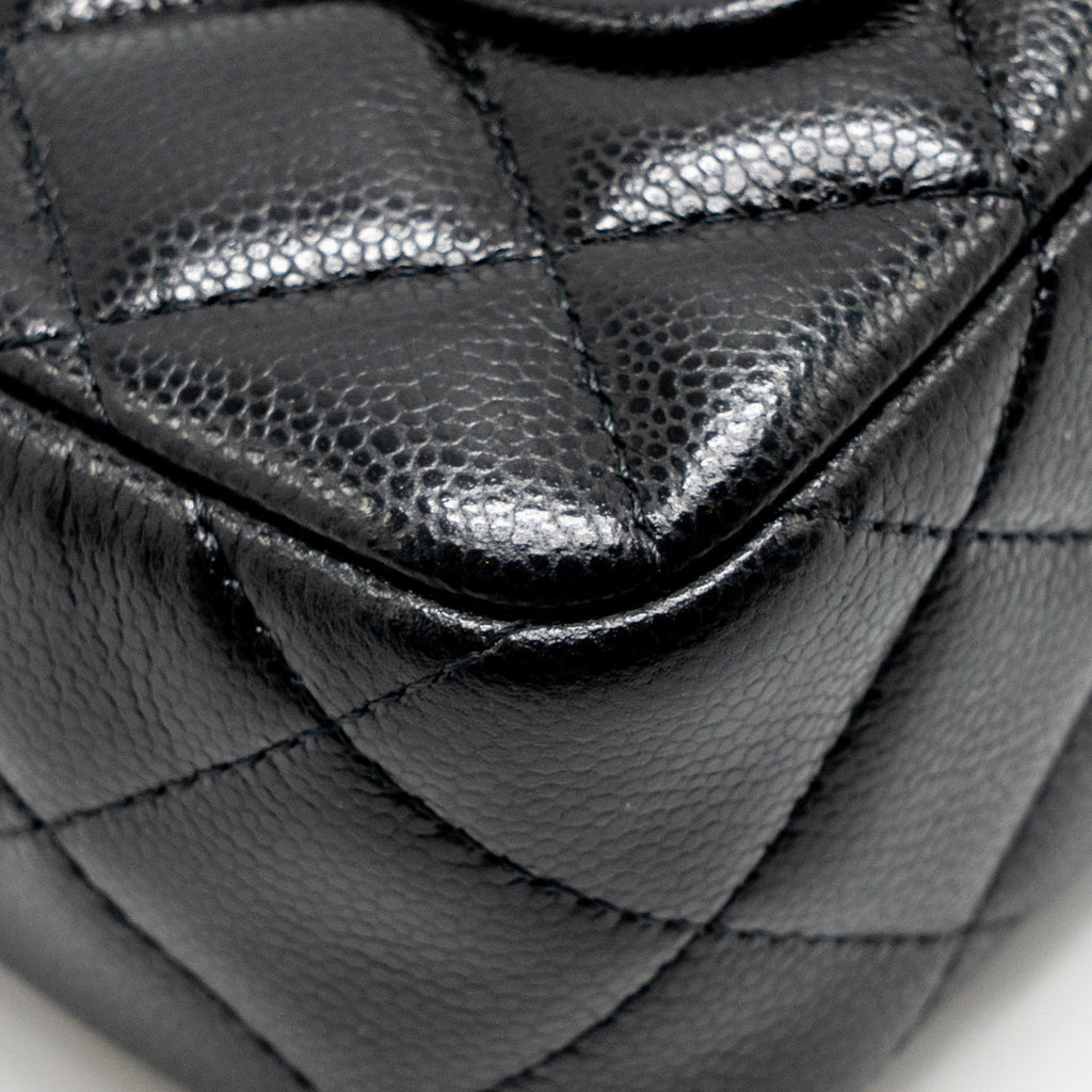 CHANEL 25A ZIP CLUTCH WITH CHAIN CAVIAR BLACK LGHW (MICROCHIP)