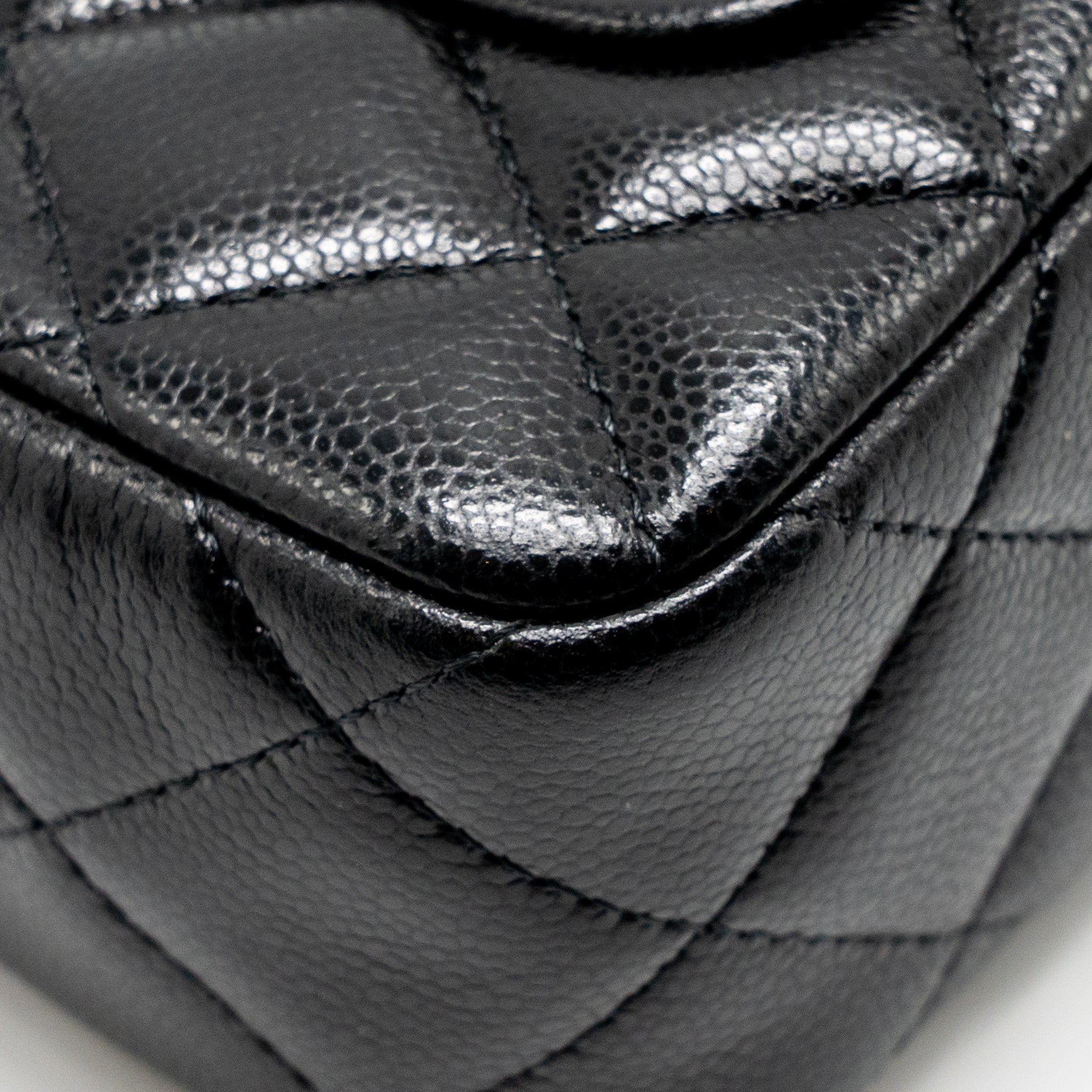 CHANEL 25A ZIP CLUTCH WITH CHAIN CAVIAR BLACK LGHW (MICROCHIP)