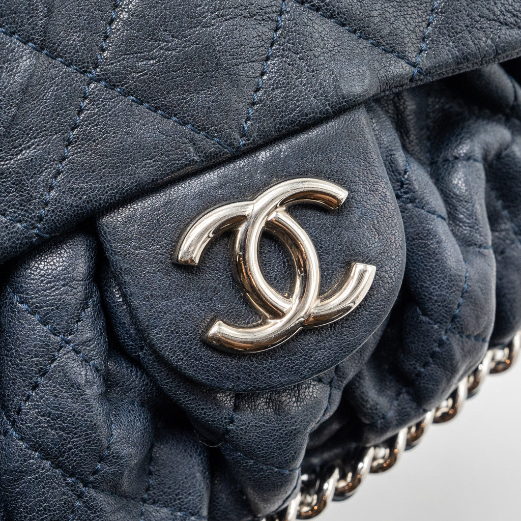 CHANEL MINI ROUND FLAP BAG WITH CHAIN AGED CALFSKIN NAVY SHW