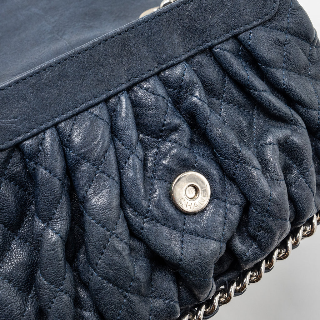 CHANEL MINI ROUND FLAP BAG WITH CHAIN AGED CALFSKIN NAVY SHW