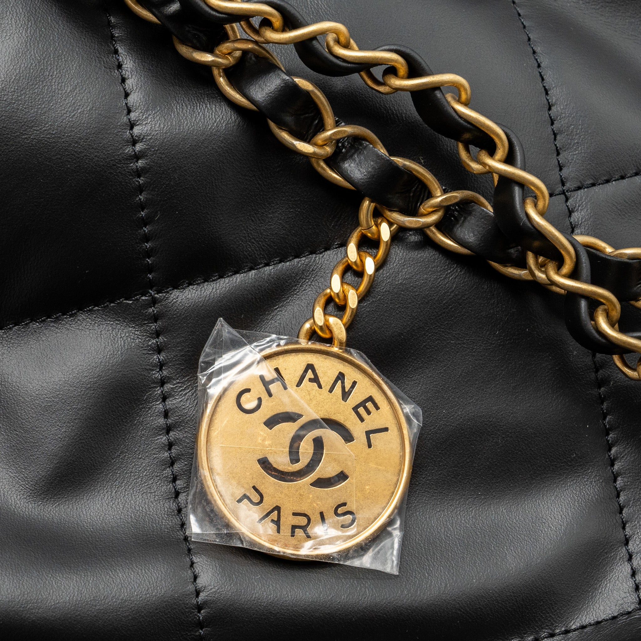 CHANEL SMALL 22 BAG CALFSKIN BLACK / WHITE LETTER GHW (MICROCHIP)
