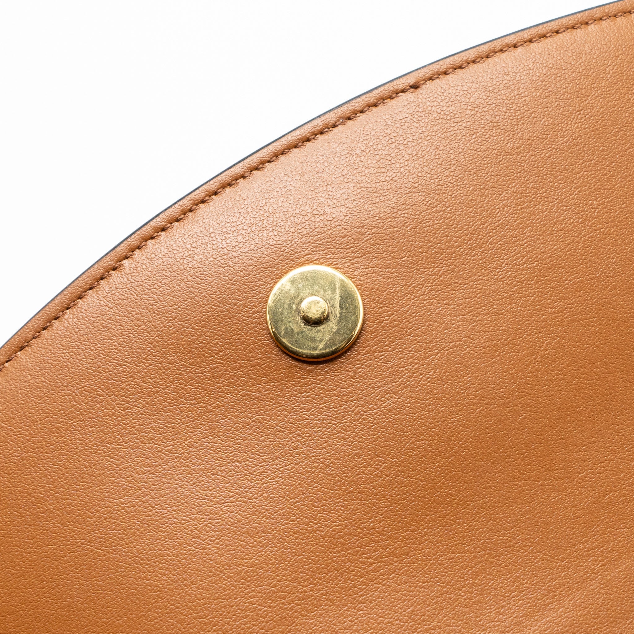 CELINE CLUTCH ON STRAP TABOU TRIOMPHE CANVAS/ CALFSKIN TAN GHW